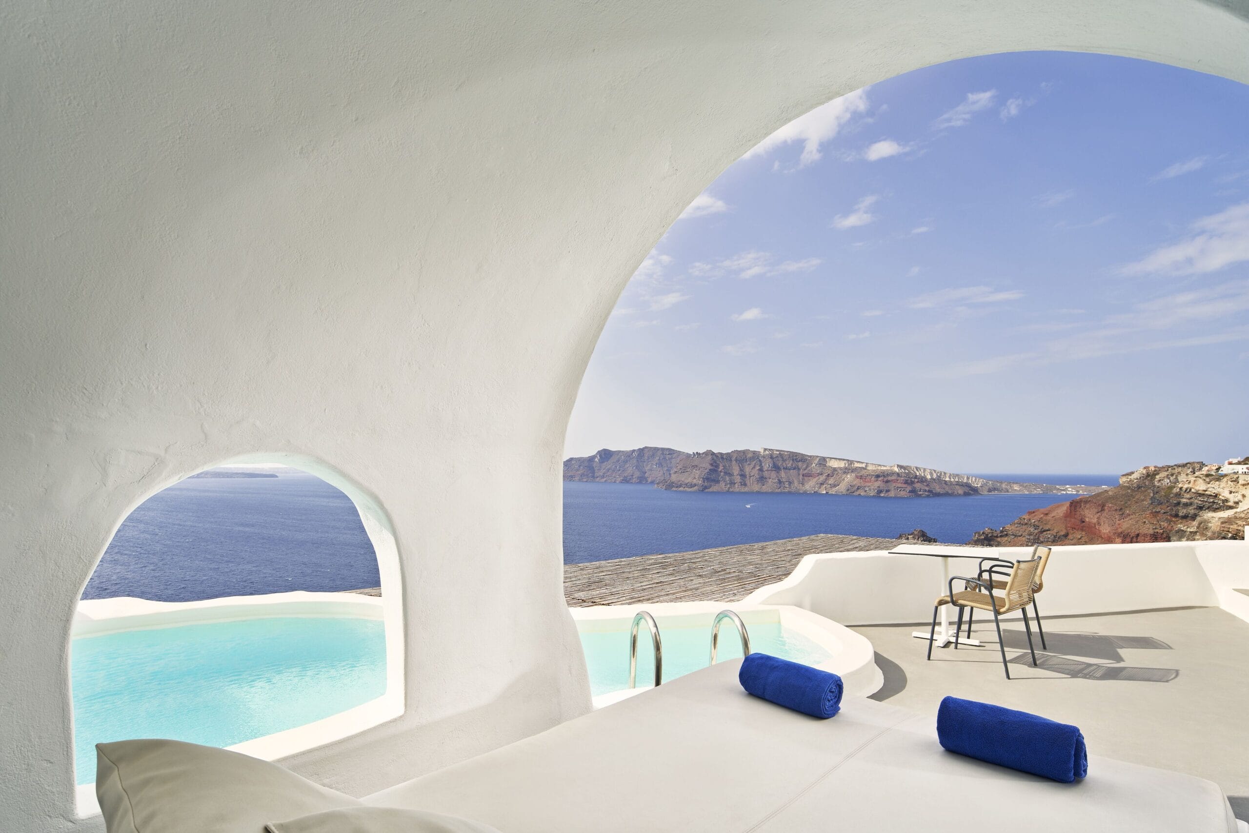 Whitewashed cave suites and cascading infinity pools at Katikies Santorini, the most iconic cave hotel in Oia