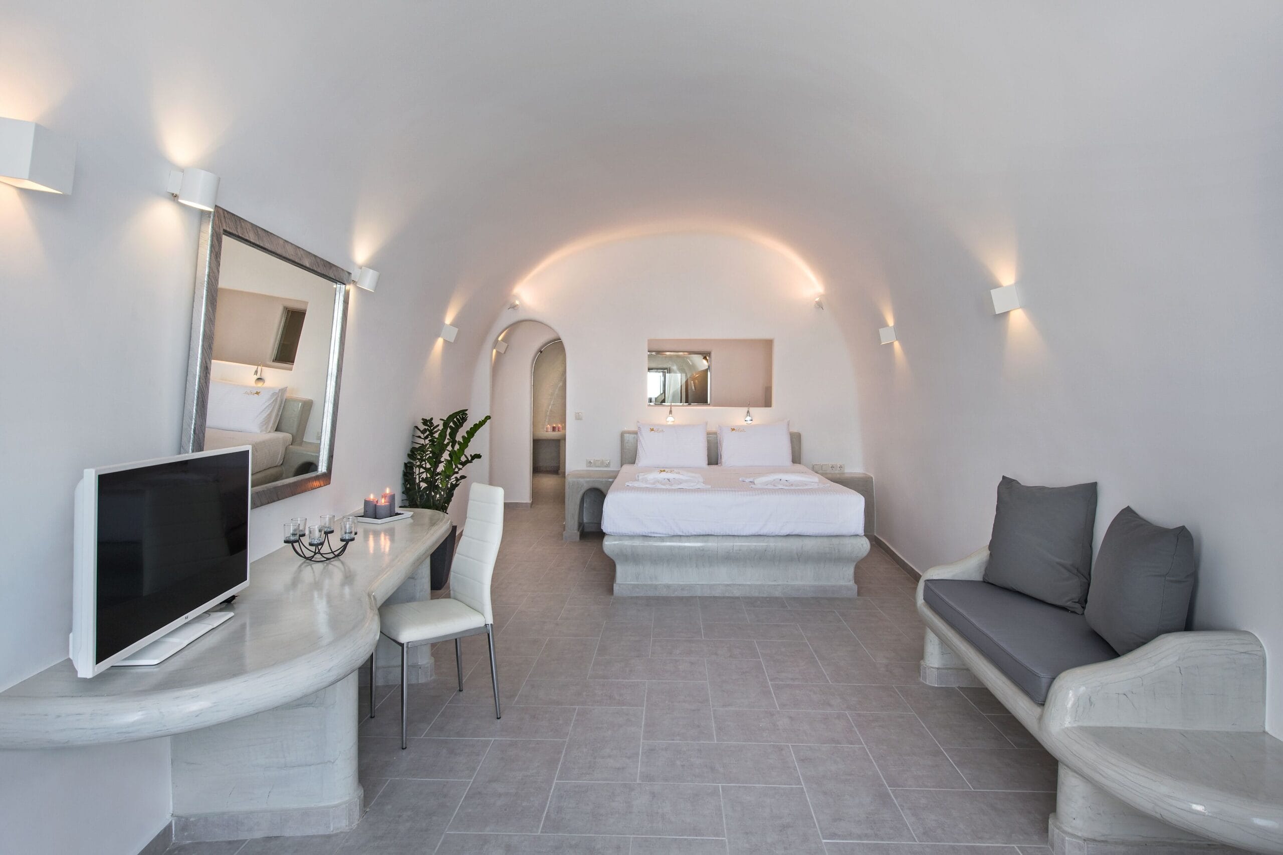 Pegasus Suites & Spa cave suite interior in Imerovigli with Cycladic design and caldera view