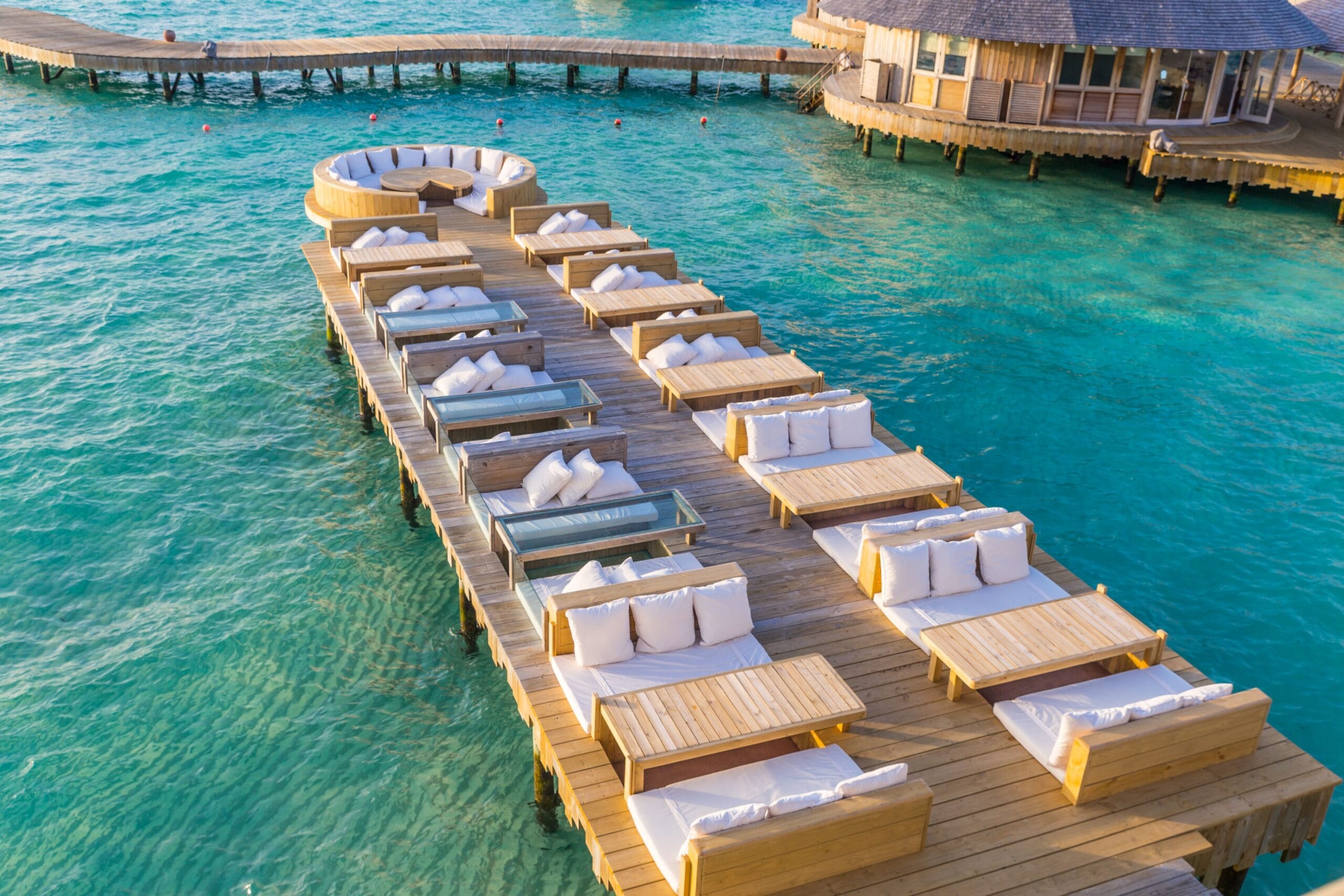 Soneva Jani Maldives water villa interior with retractable roof for stargazing over the lagoon