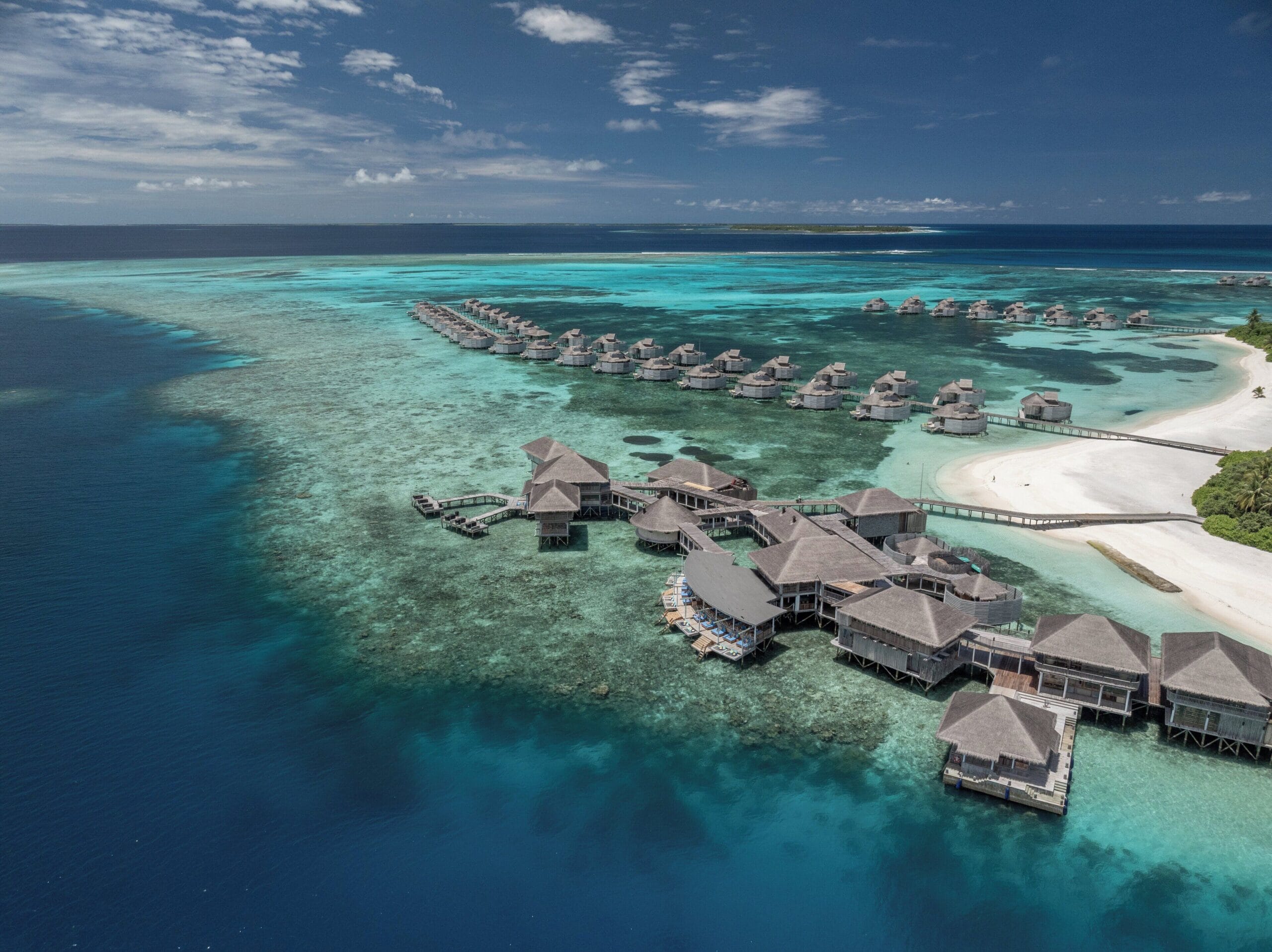 Six Senses Laamu house reef and overwater villas, one of the best Maldives water villa reefs