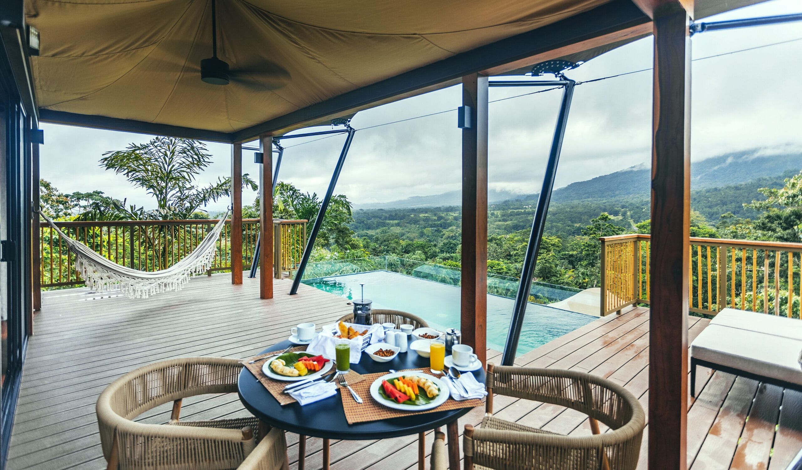 Elevated luxury tent on stilts with private plunge pool and Arenal volcano view at Nayara Tented Camp, Costa Rica