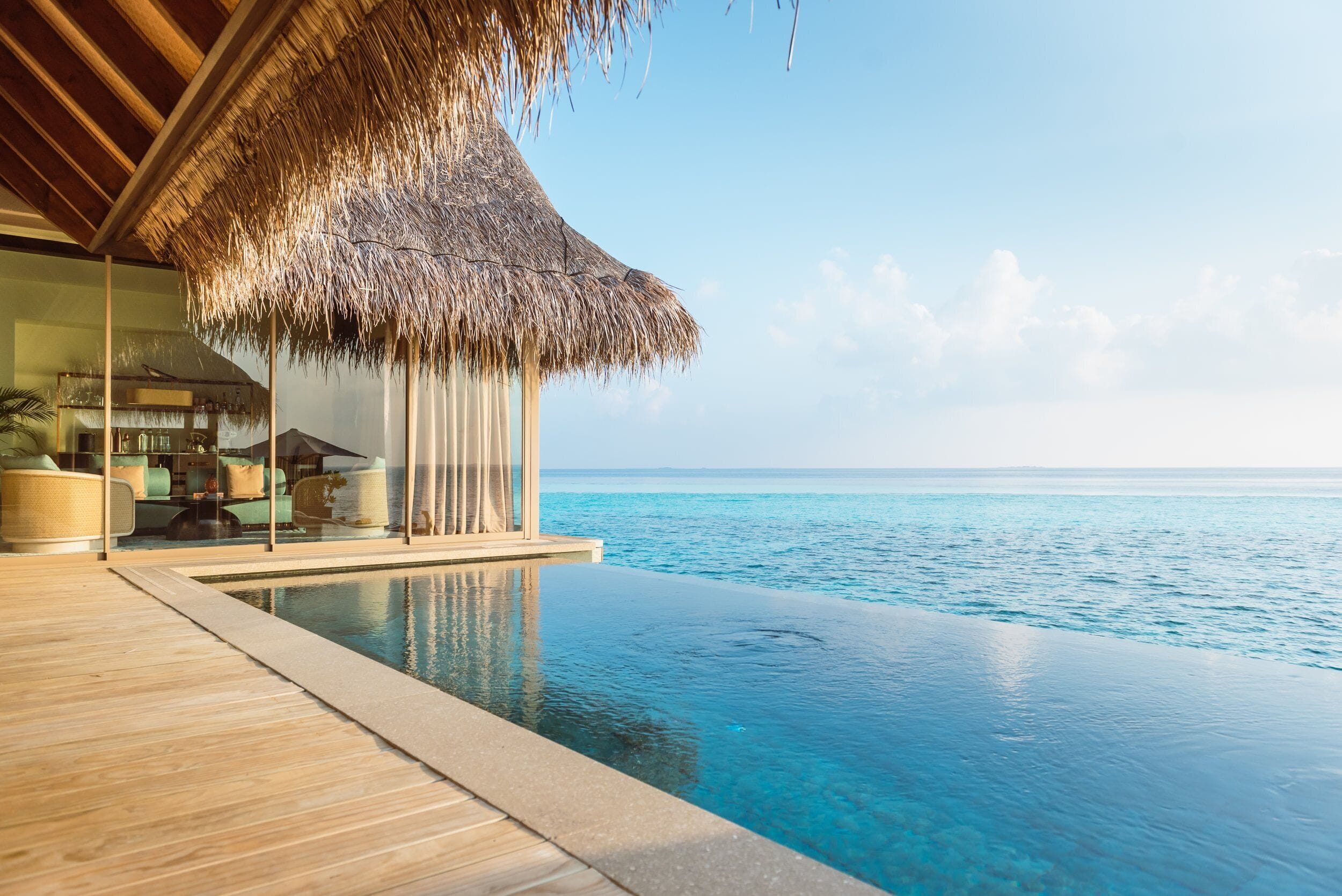 Overwater pool villa at JOALI Maldives, an art-immersive Maldives overwater bungalow in Raa Atoll
