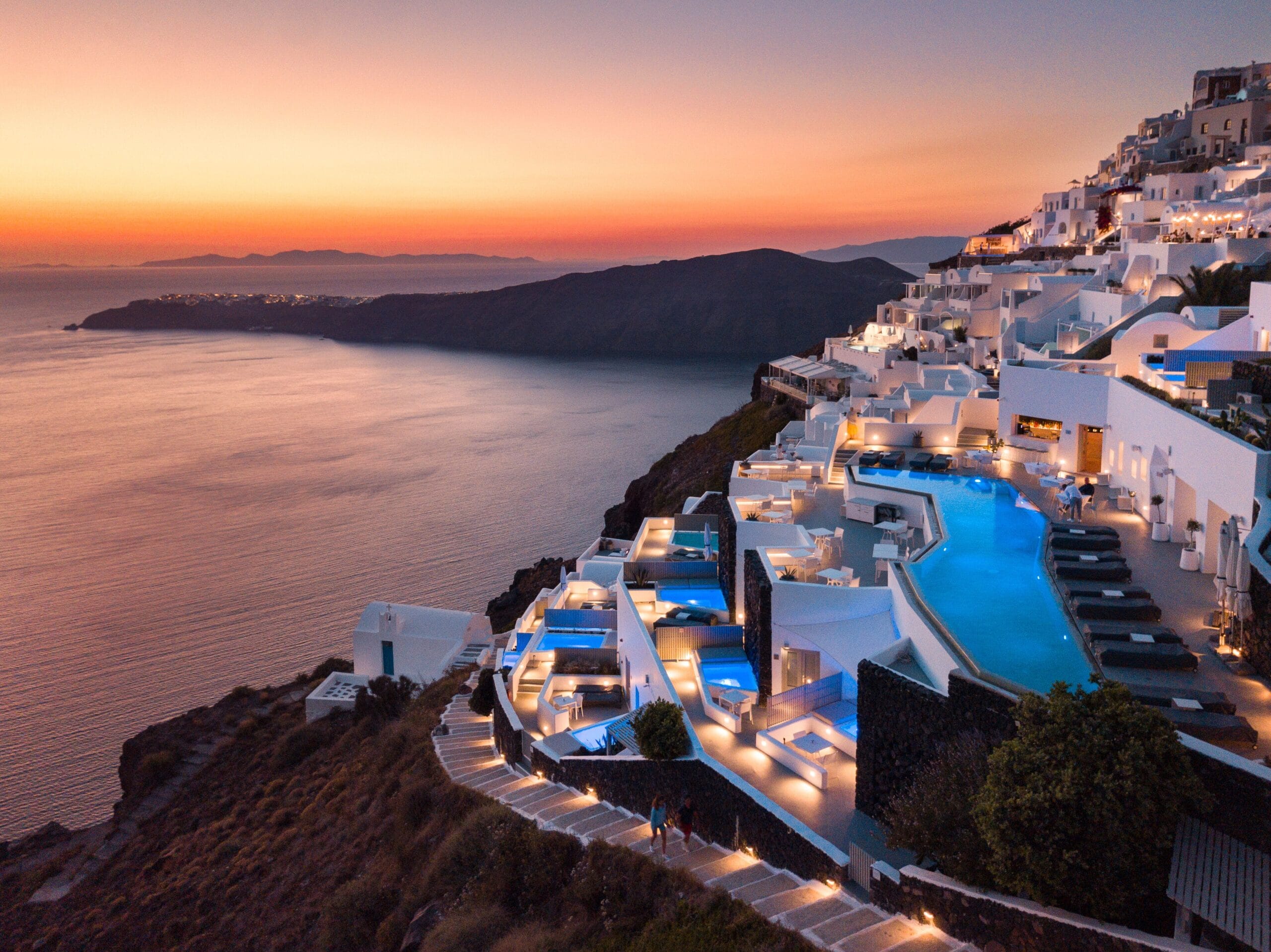 Private plunge pool terrace overlooking Skaros Rock and the caldera at Grace Hotel Santorini, Imerovigli