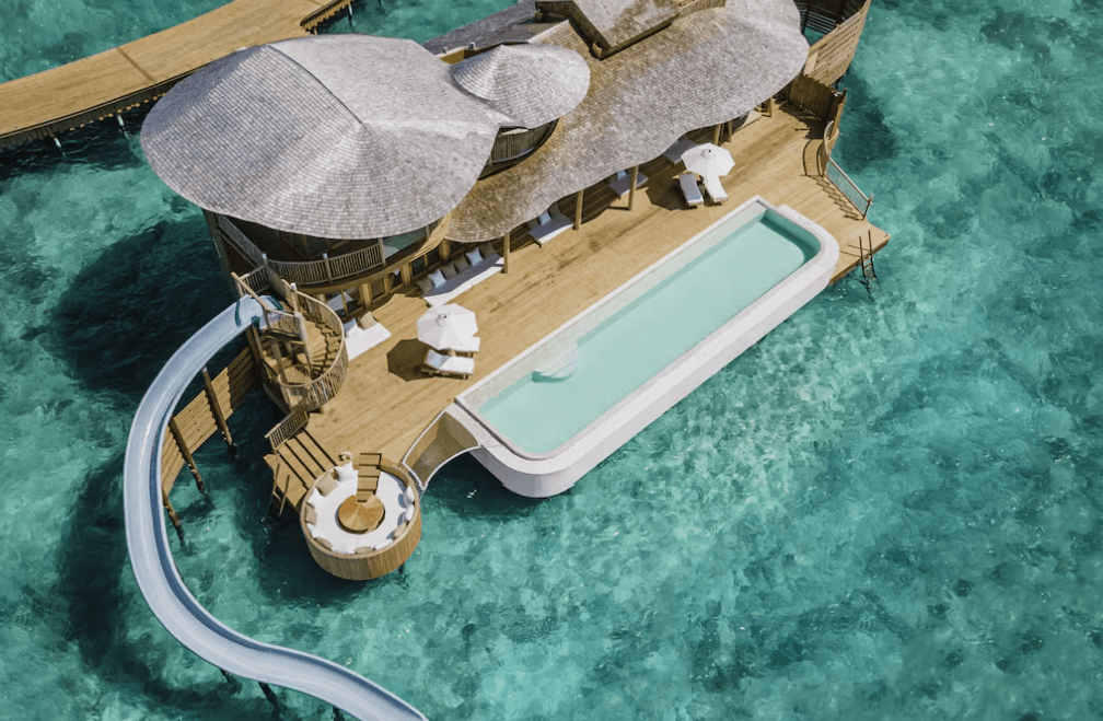 Overwater villa with water slide and retractable roof at Soneva Jani, the best overwater bungalow in the Maldives