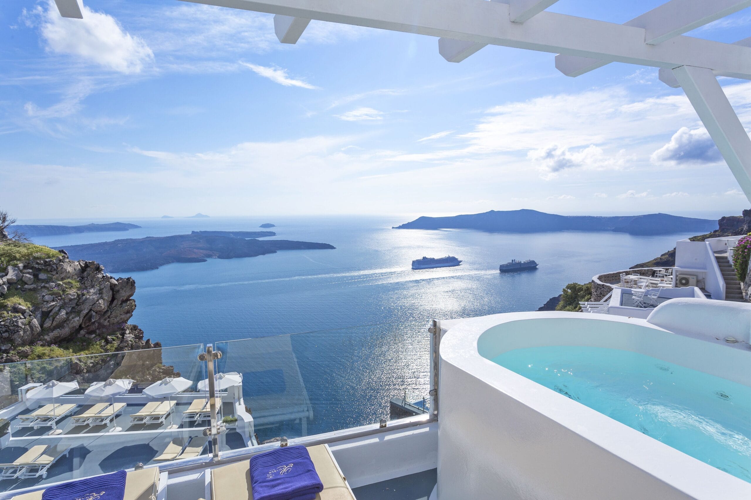 Private hot tub and terrace overlooking the caldera at Pegasus Suites & Spa, Santorini