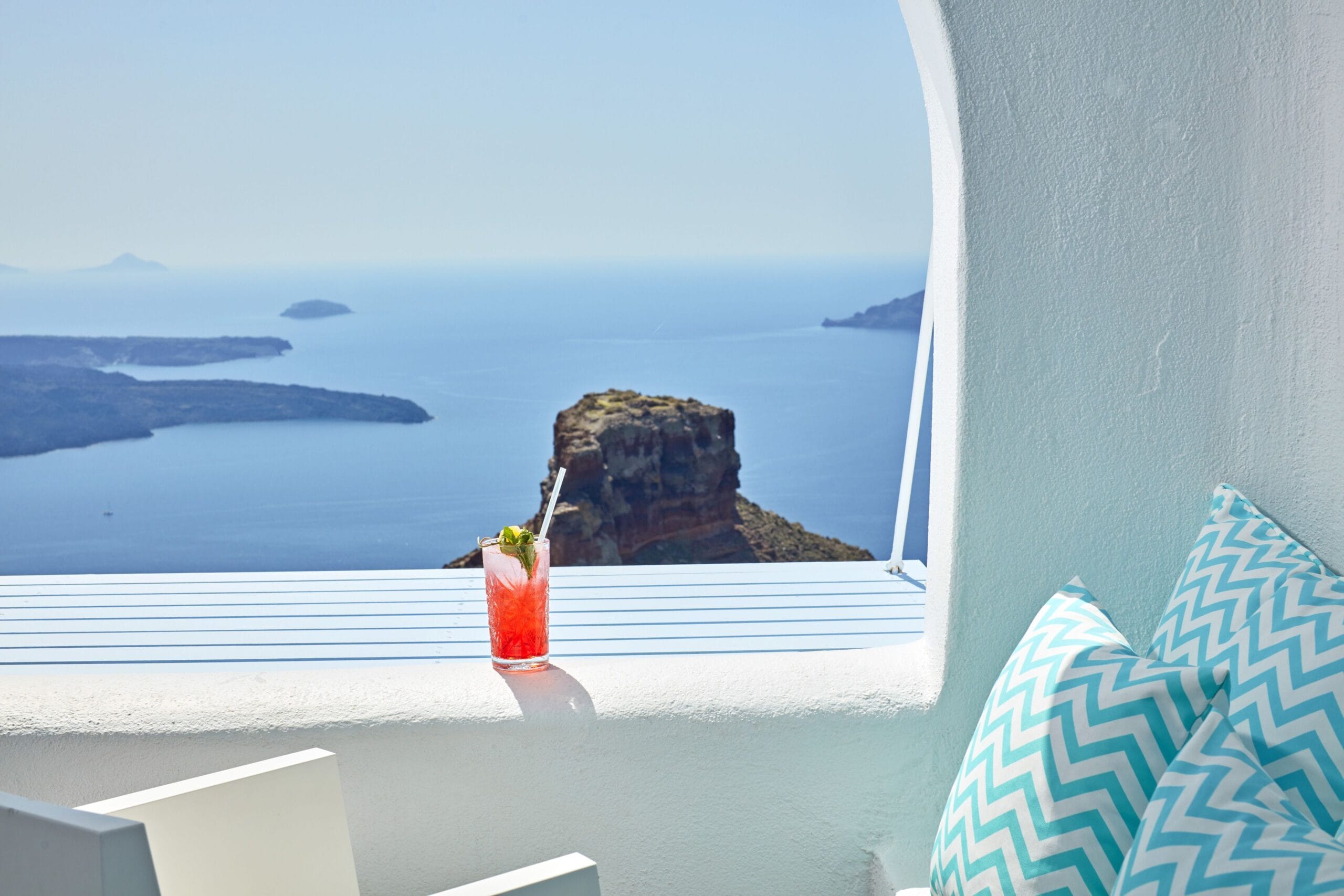 Private terrace with jacuzzi overlooking the volcano and caldera at Astra Suites, Imerovigli Santorini