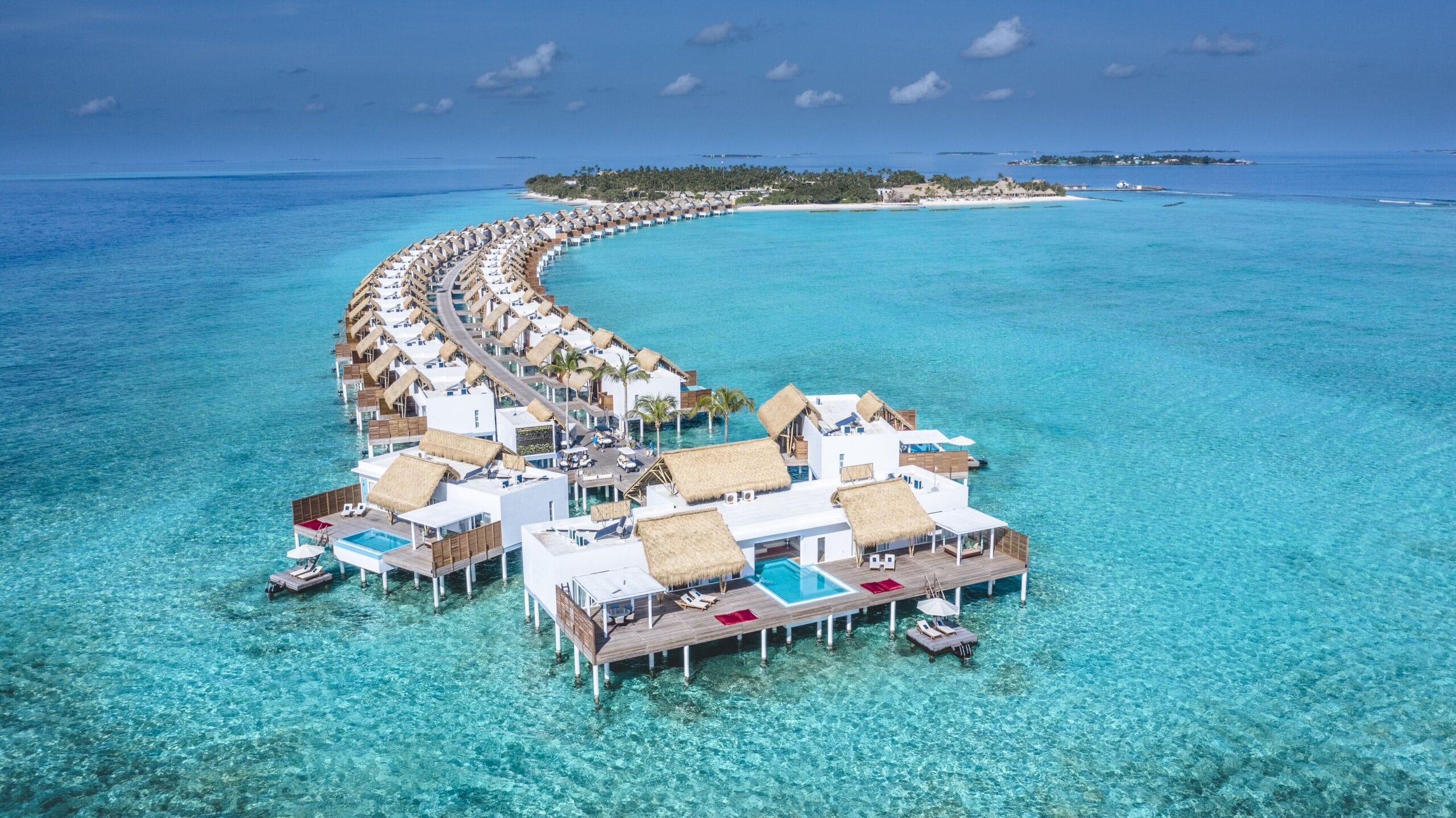Emerald Maldives lagoon and overwater villas with house reef, a top Maldives overwater bungalow