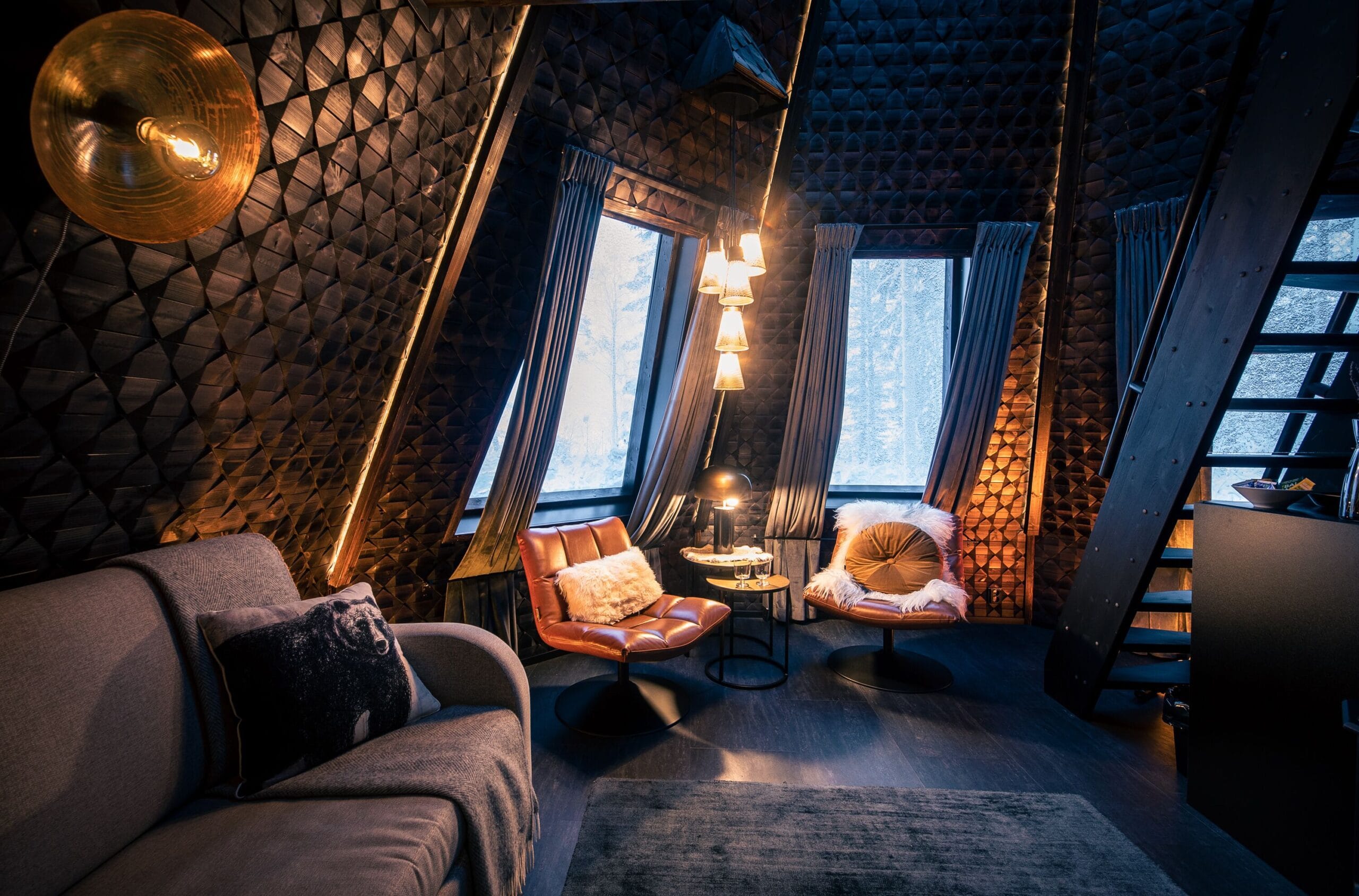Two-level Komsio glass igloo suite with 360-degree glass roof at Apukka Resort near Rovaniemi, Finland