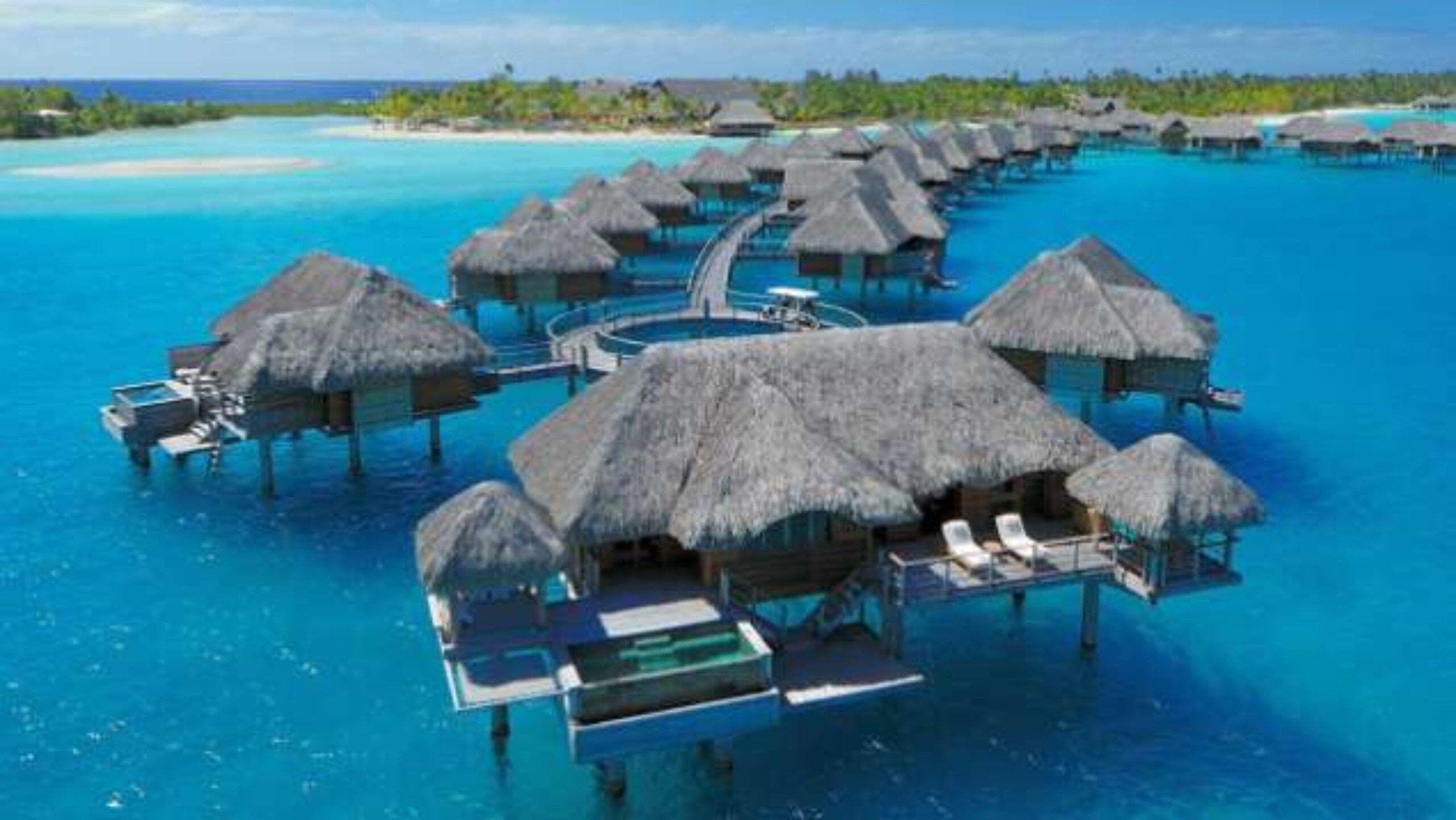 Aerial view of the overwater bungalows and lagoon at Four Seasons Resort Bora Bora