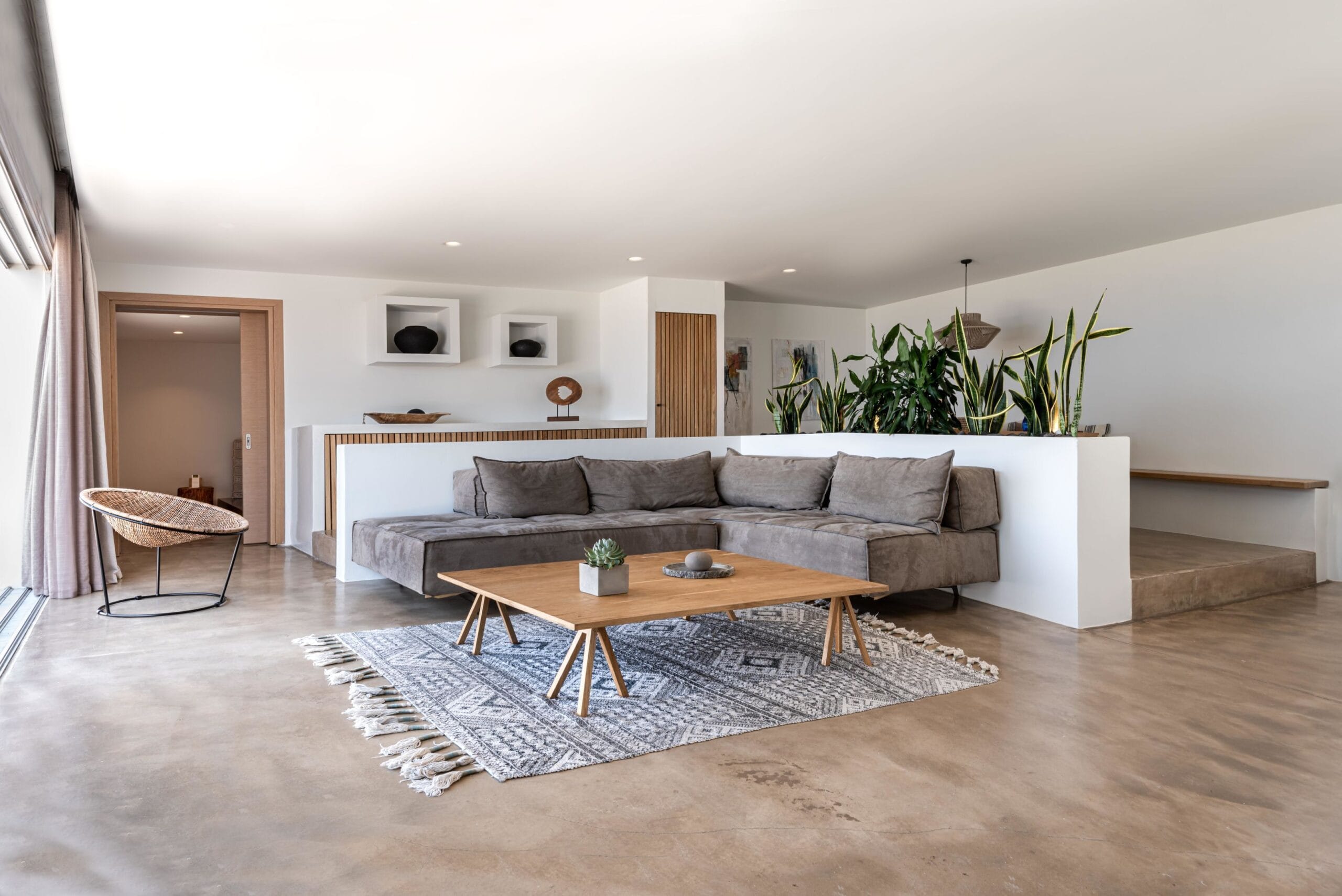 Andronis Arcadia luxury villa living room with earthy Cycladic design