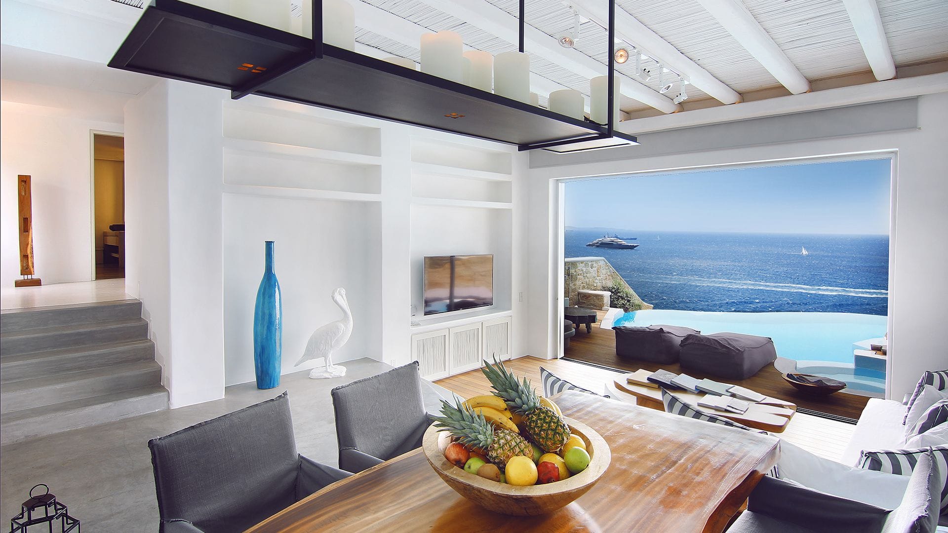 Luxury suite with private infinity pool overlooking the sea at Cavo Tagoo Mykonos