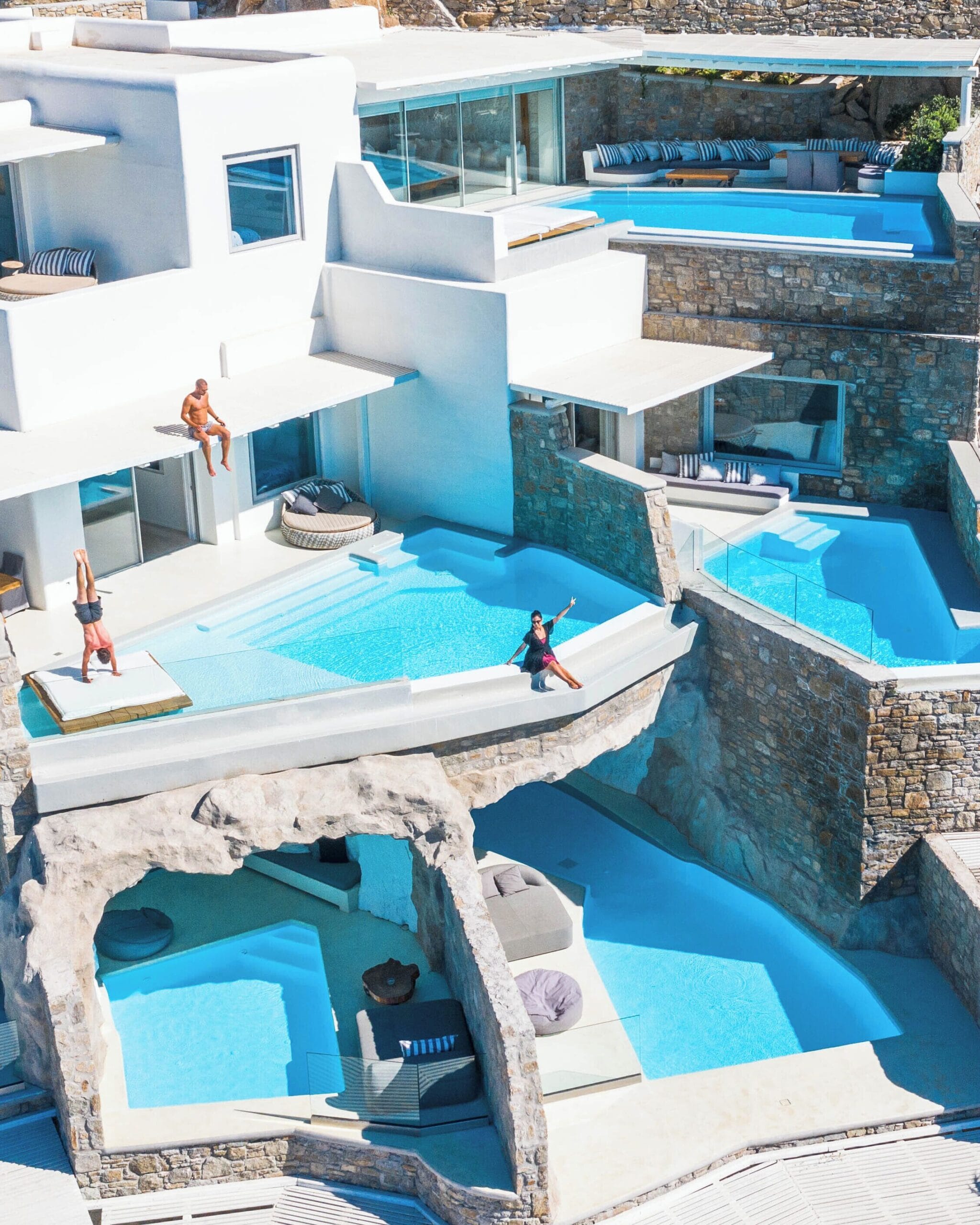 Private pool suites carved into the hillside above the Aegean at Cavo Tagoo Mykonos