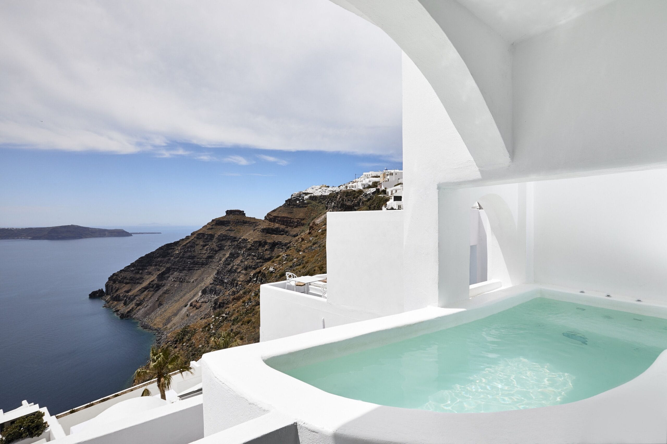Small private plunge pool on a Santorini suite terrace overlooking the caldera