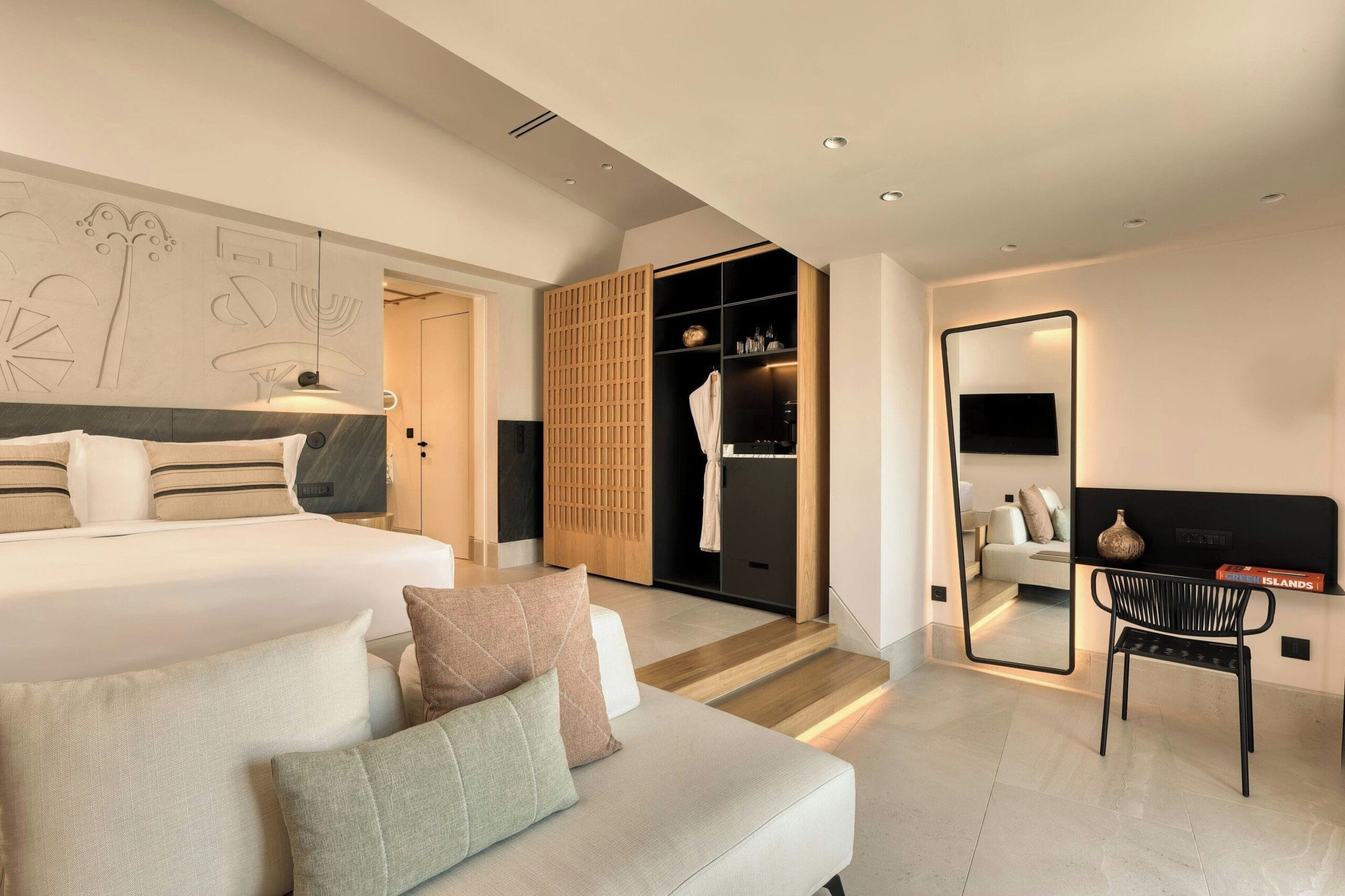 Modern luxury suite interior at Domes Novos Santorini, Autograph Collection