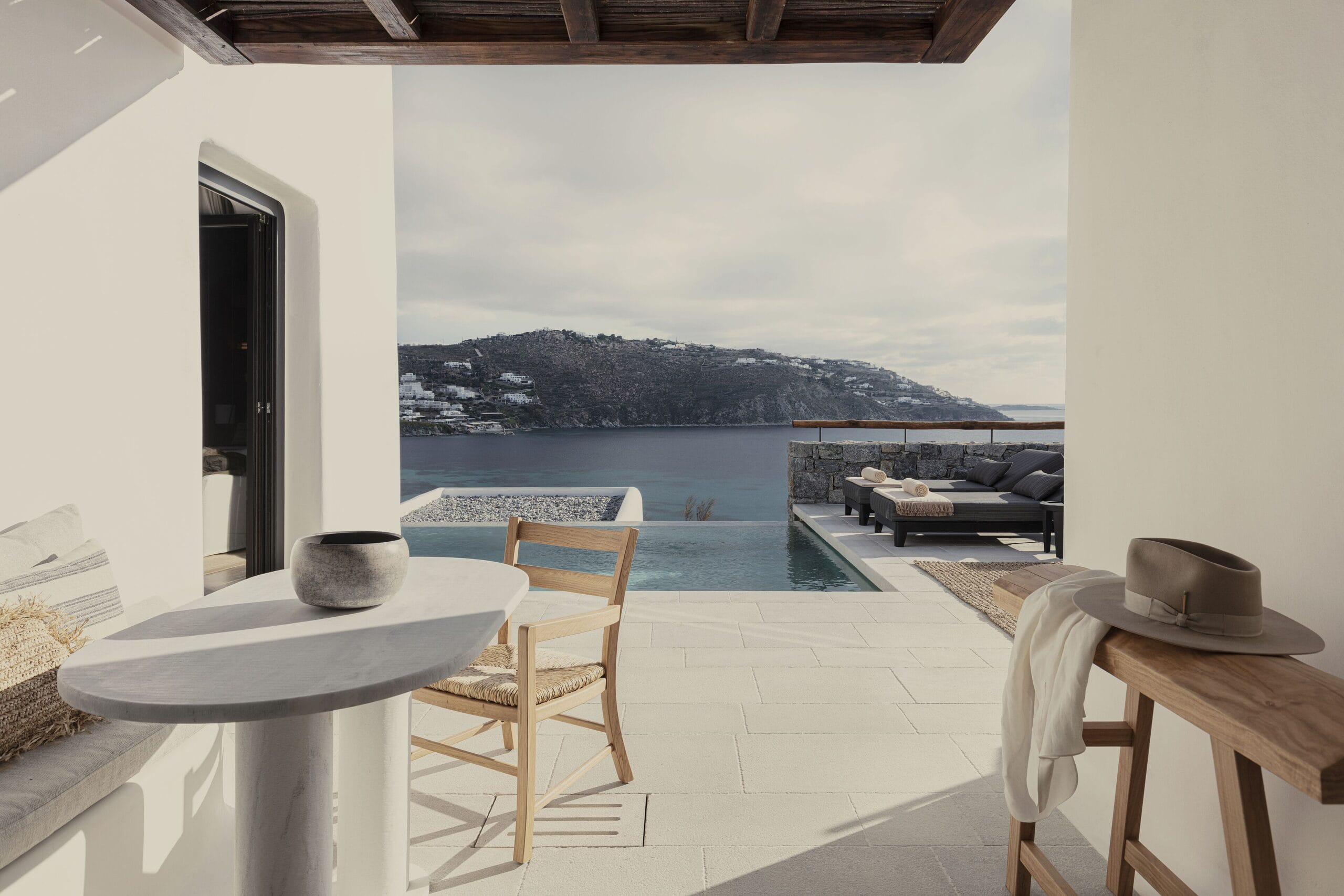 Private infinity pool terrace overlooking the Aegean at Kalesma Mykonos