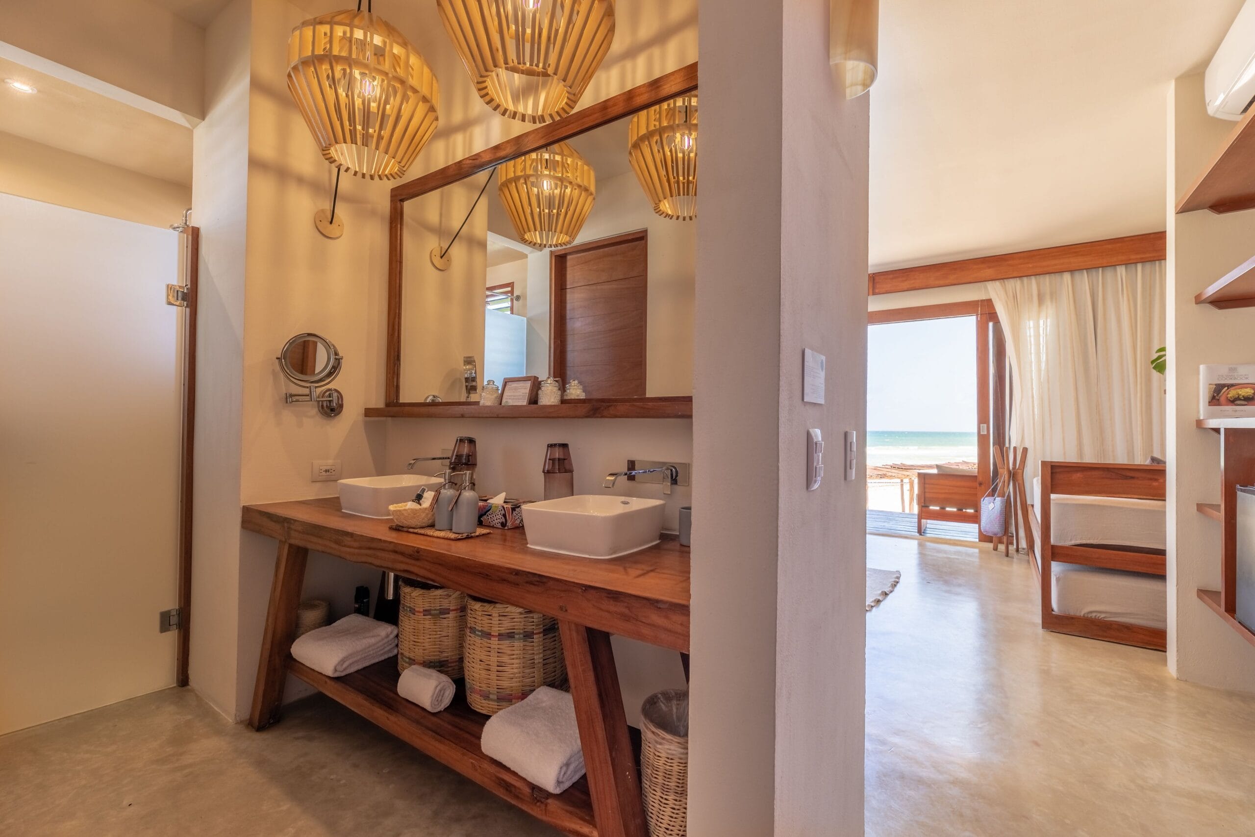 Luxury bathroom with dual vanities at a La Zebra Tulum suite