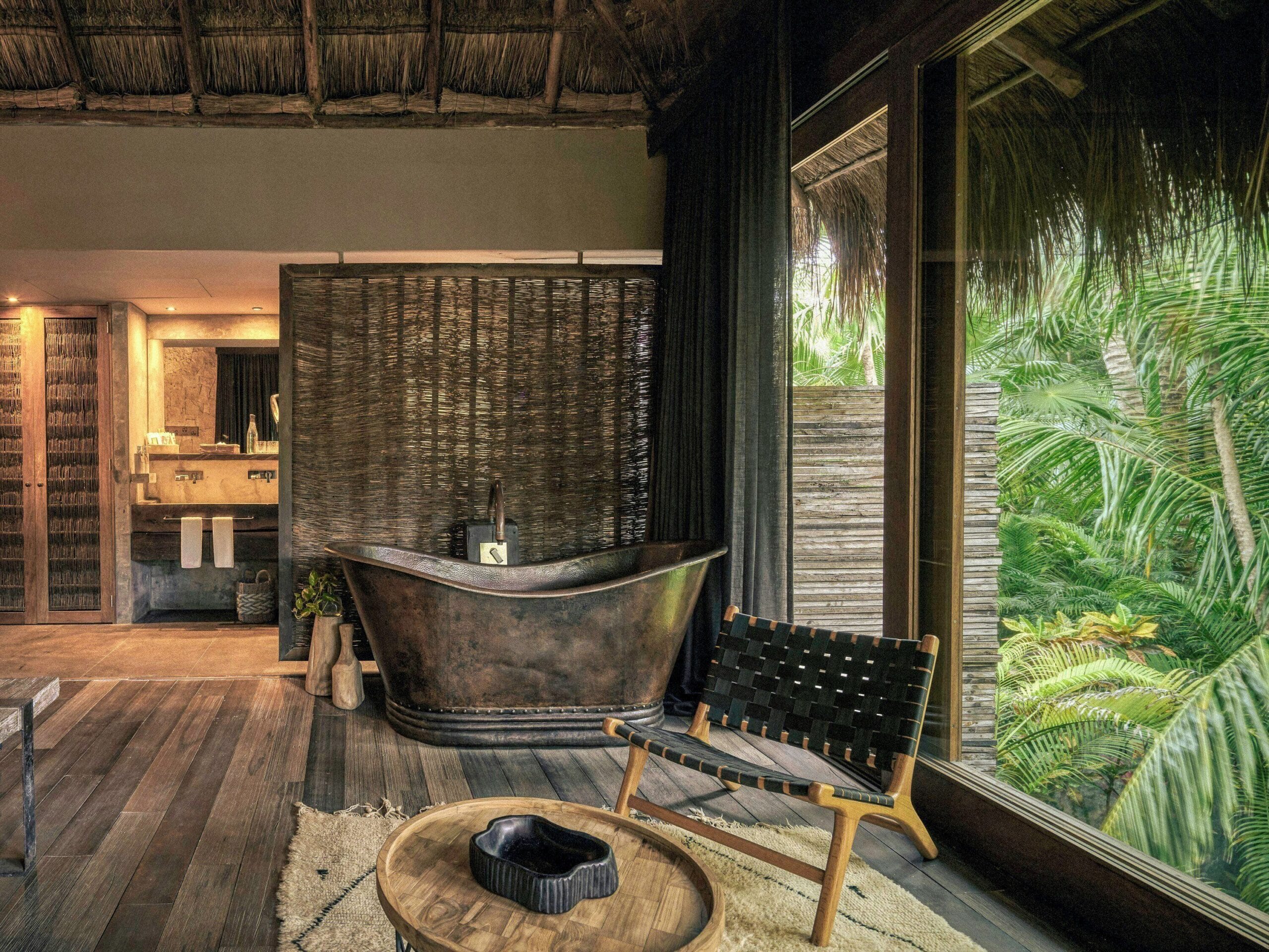 Luxury suite bathroom with rainfall shower at Be Tulum
