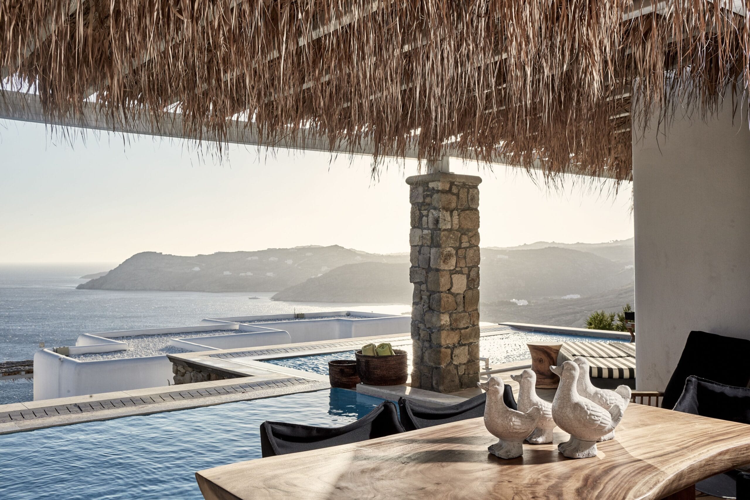 Private pool terrace with sea views at Myconian Villa Collection, Mykonos