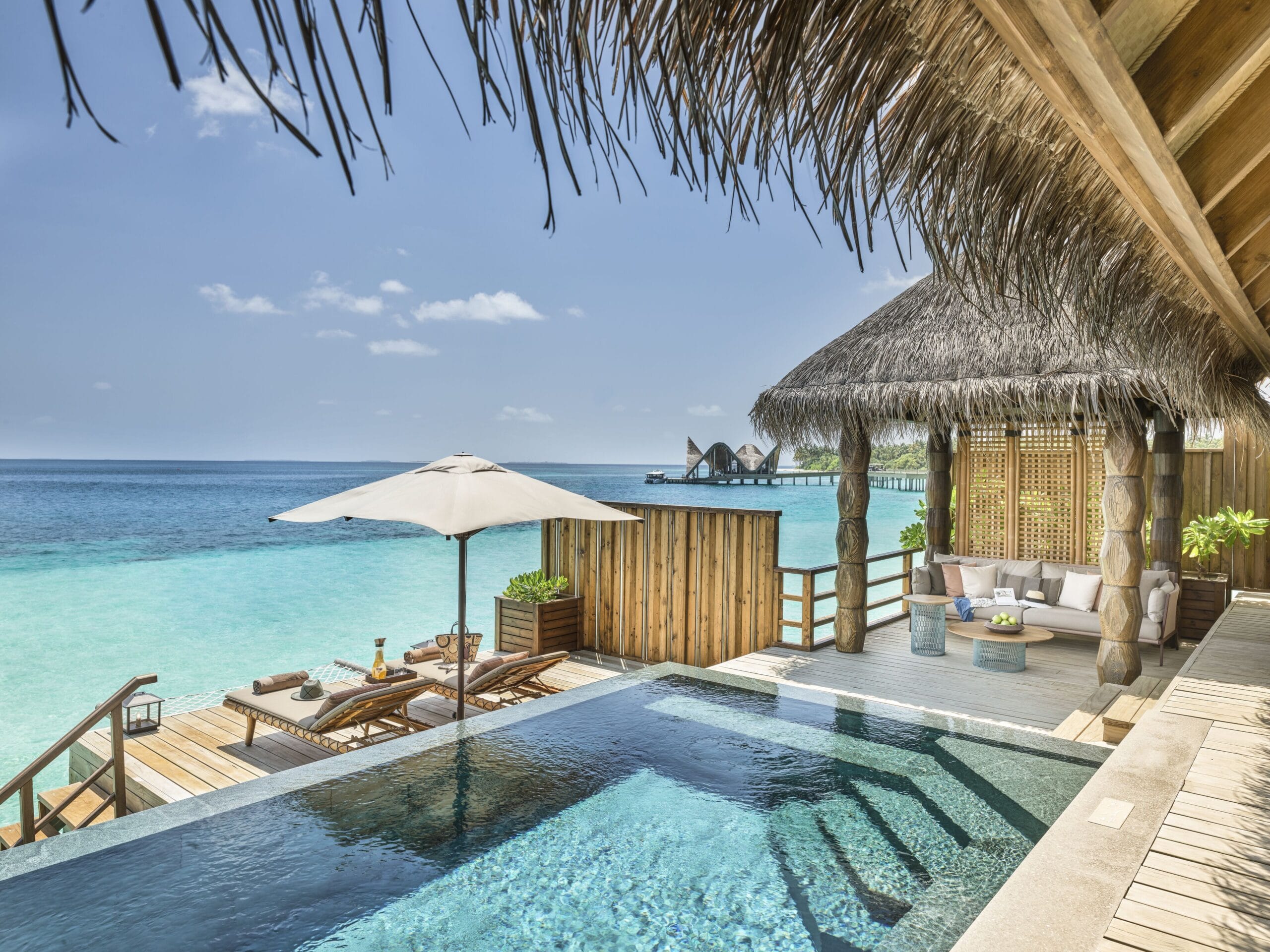 Private infinity pool on an overwater villa terrace at JOALI Maldives, a luxury honeymoon resort in the Maldives