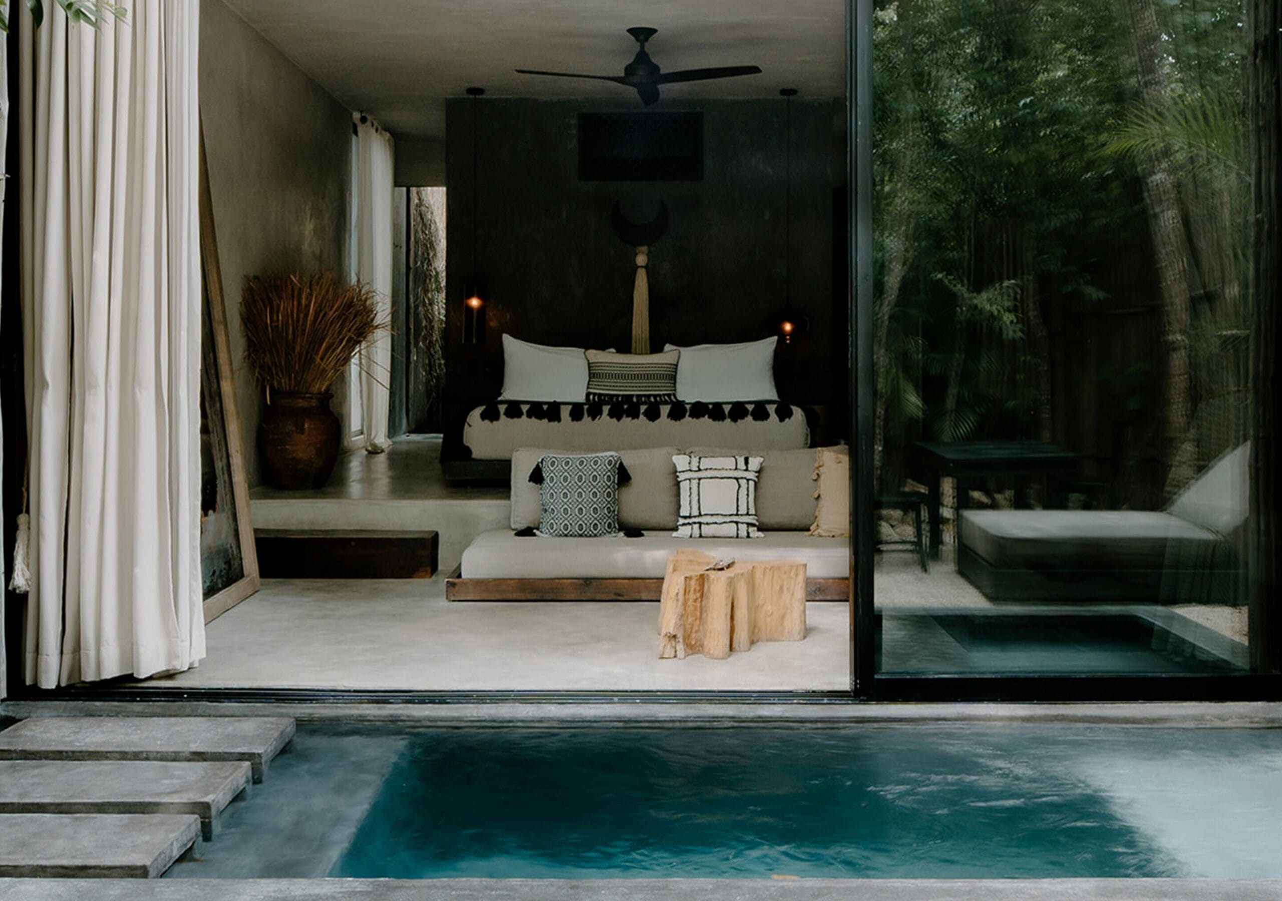 Private plunge pool in a walled jungle garden at a Hotel Bardo suite in Tulum, Mexico