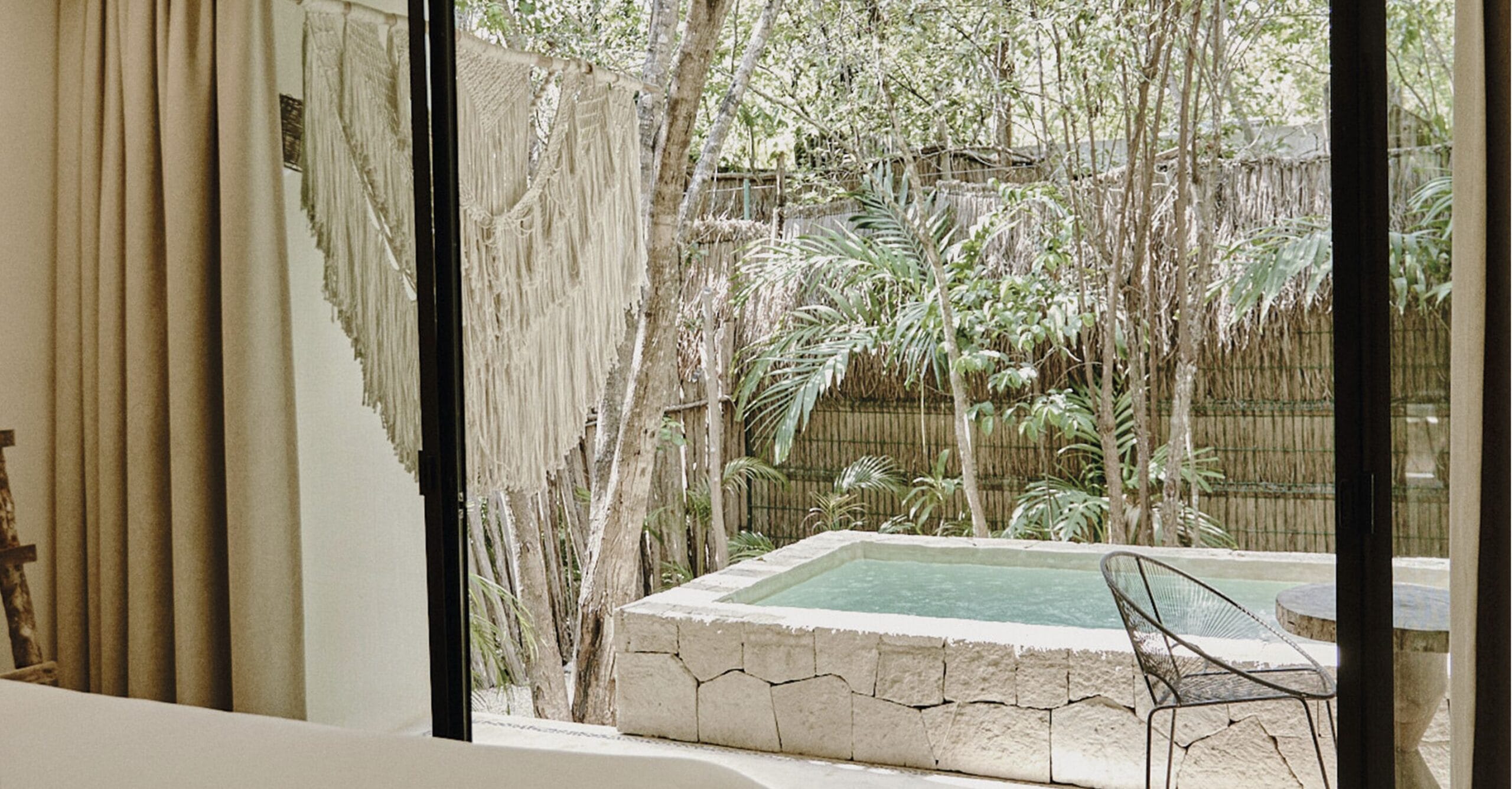 Private plunge pool in a jungle garden at a Una Vida villa in Tulum, Mexico