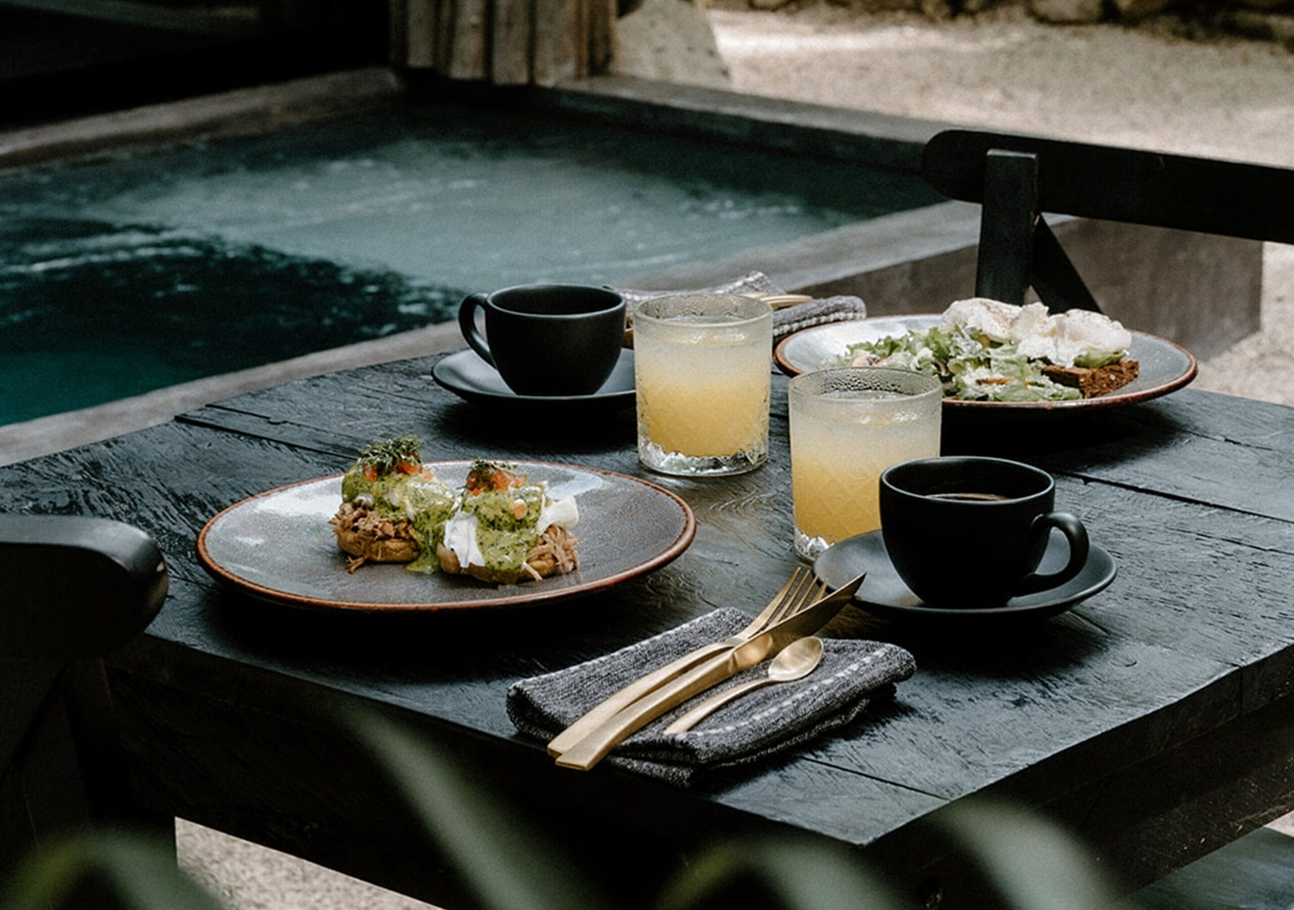 Private plunge pool and outdoor dining area at a Hotel Bardo suite in Tulum