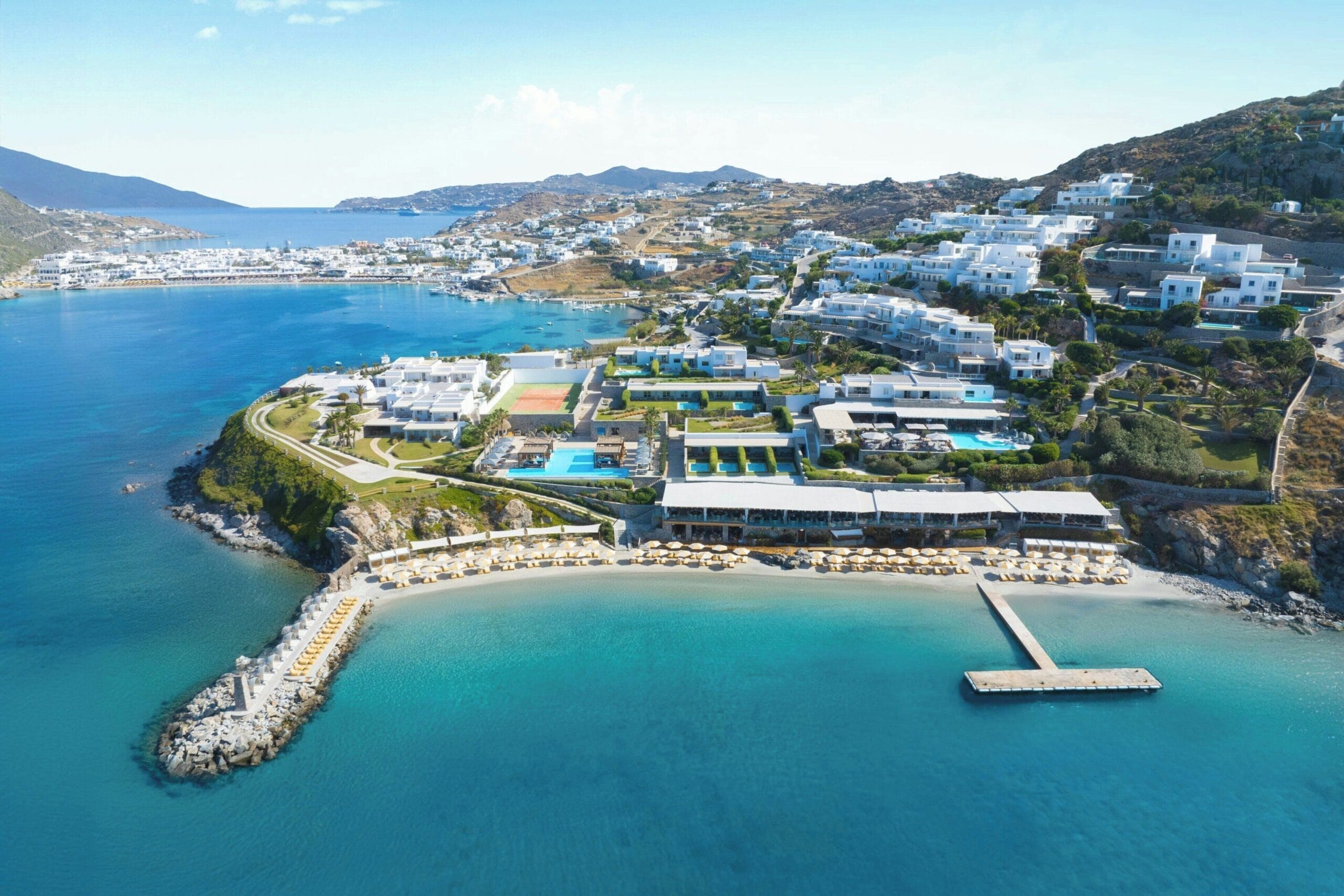 Aerial view of Santa Marina resort on its private peninsula above Ornos Bay, Mykonos