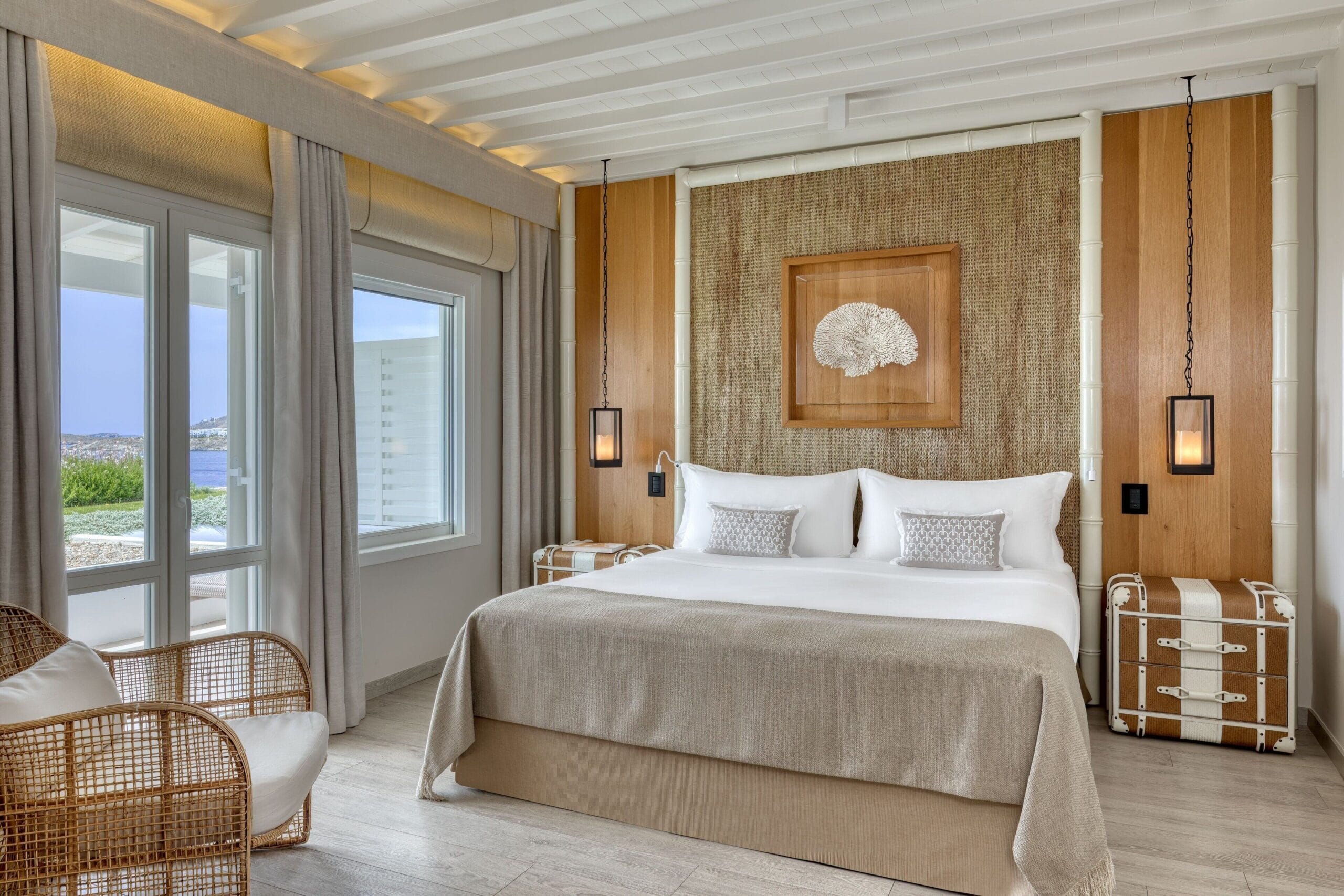 Luxury suite bedroom with sea views at Santa Marina, Mykonos