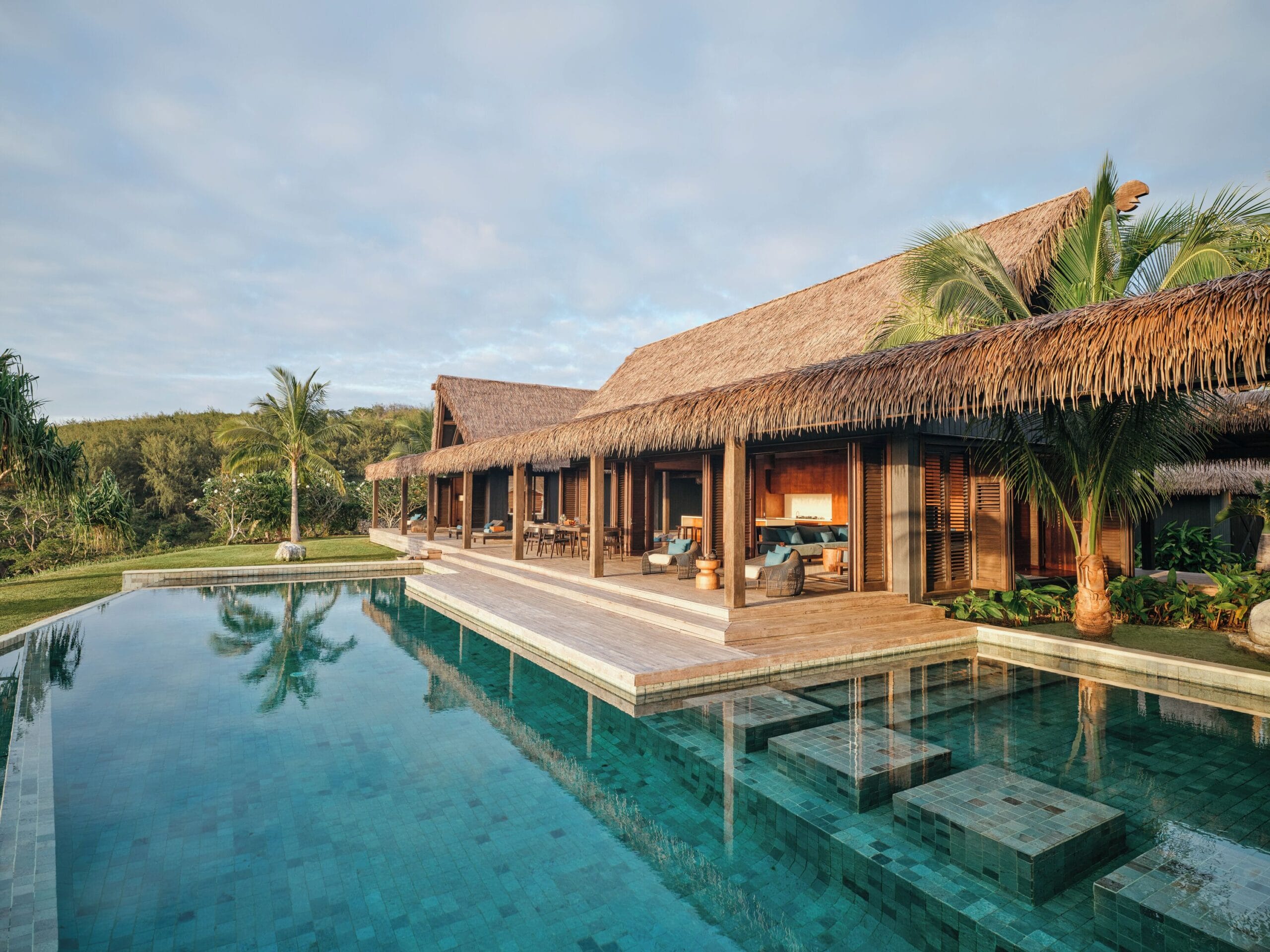 Private pool villa exterior with a plunge pool overlooking the sea at Six Senses Fiji