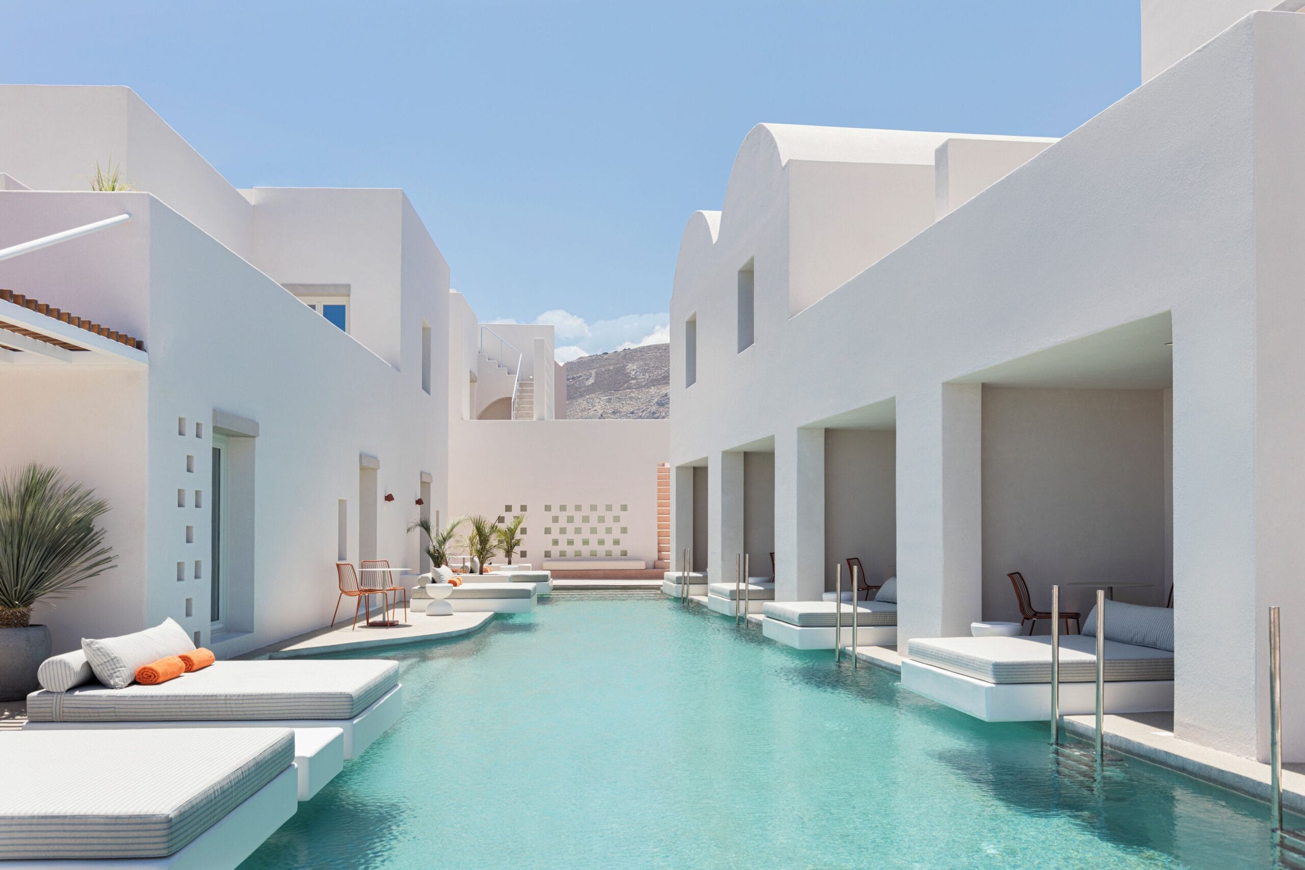 Shared pool serving several suites at a Santorini hotel