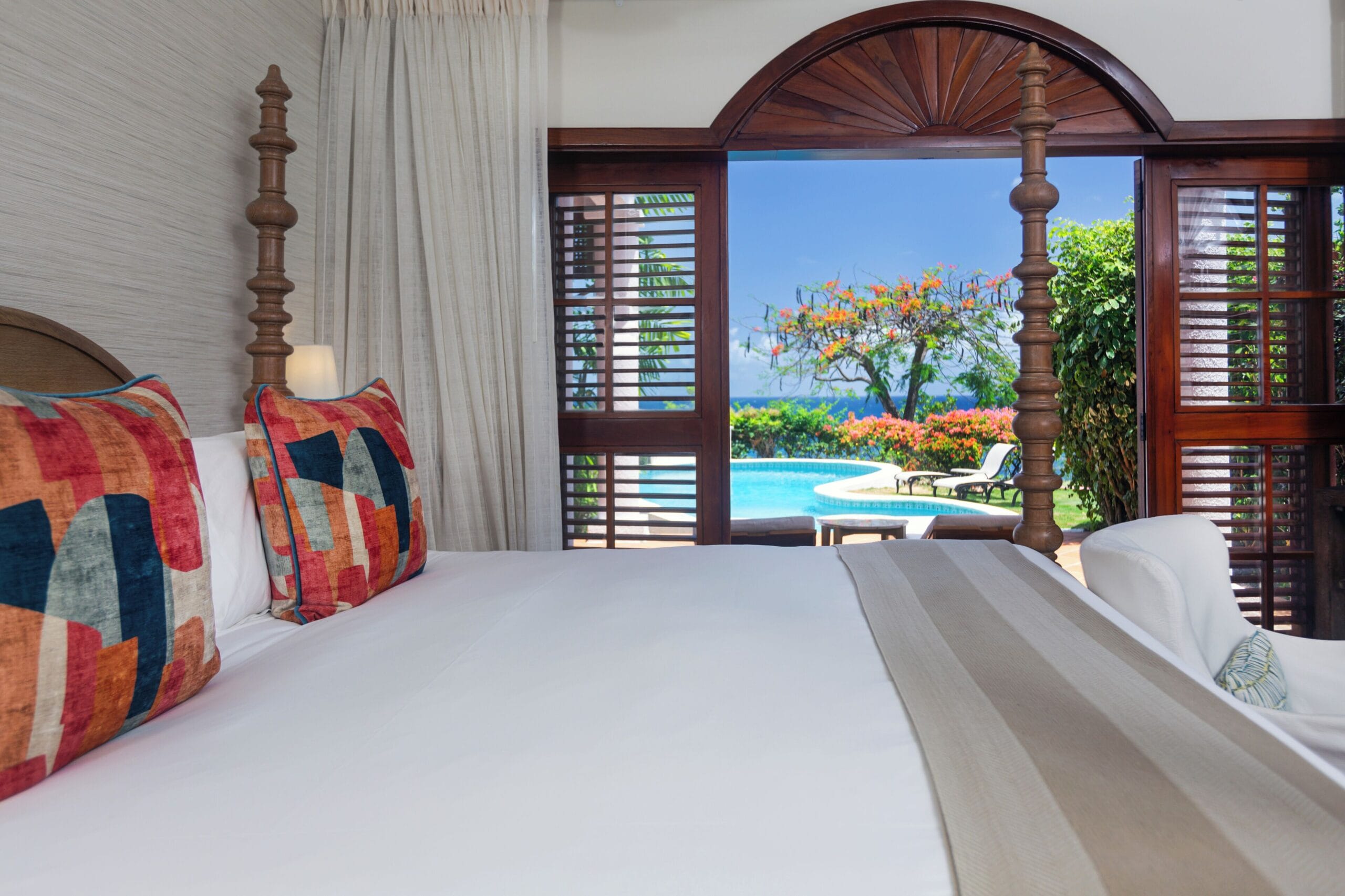 Four-poster bedroom in a private pool villa suite at Cap Maison, St. Lucia