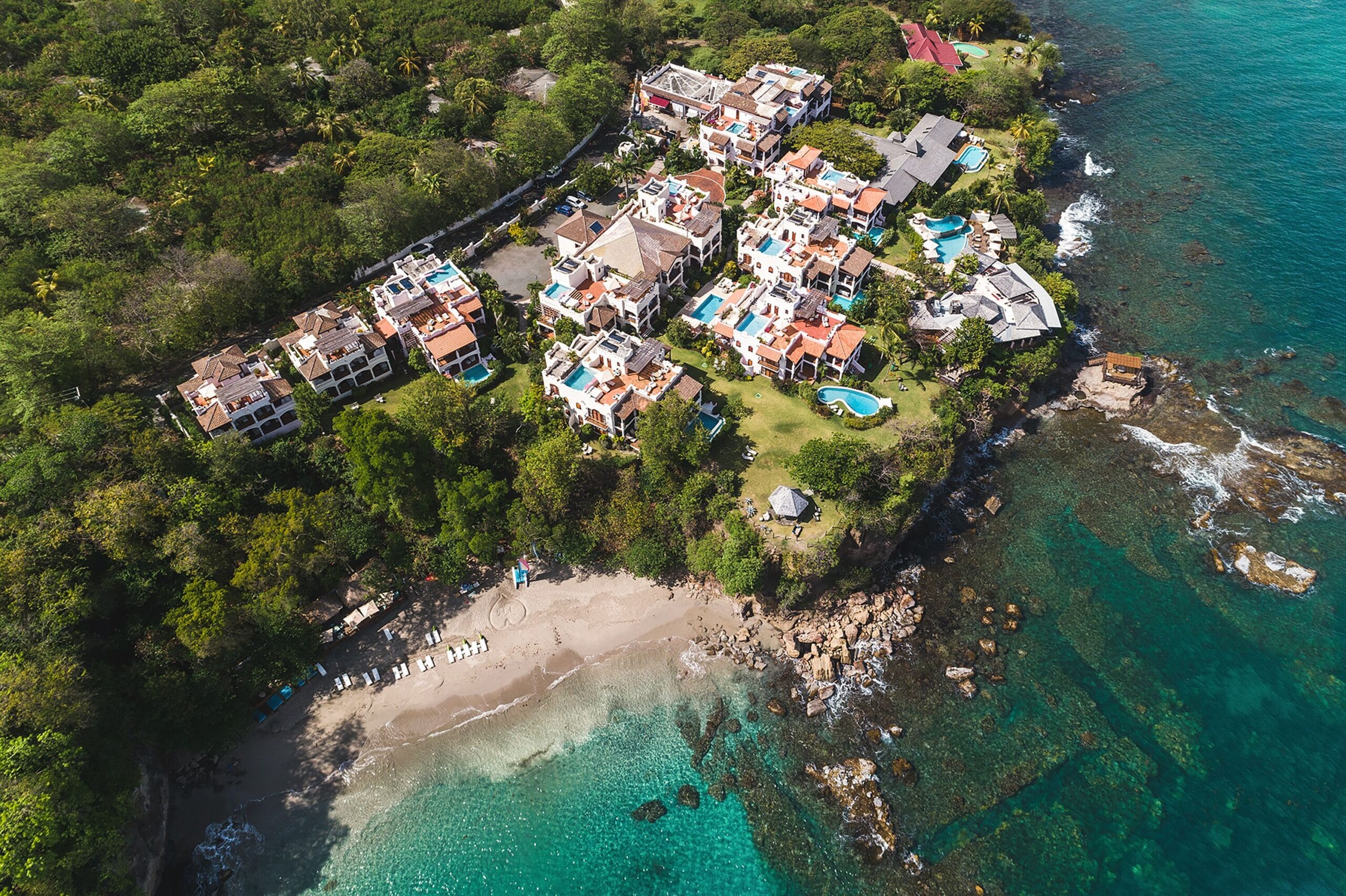 Aerial view of Cap Maison Resort and Spa above Smuggler's Cove in St. Lucia