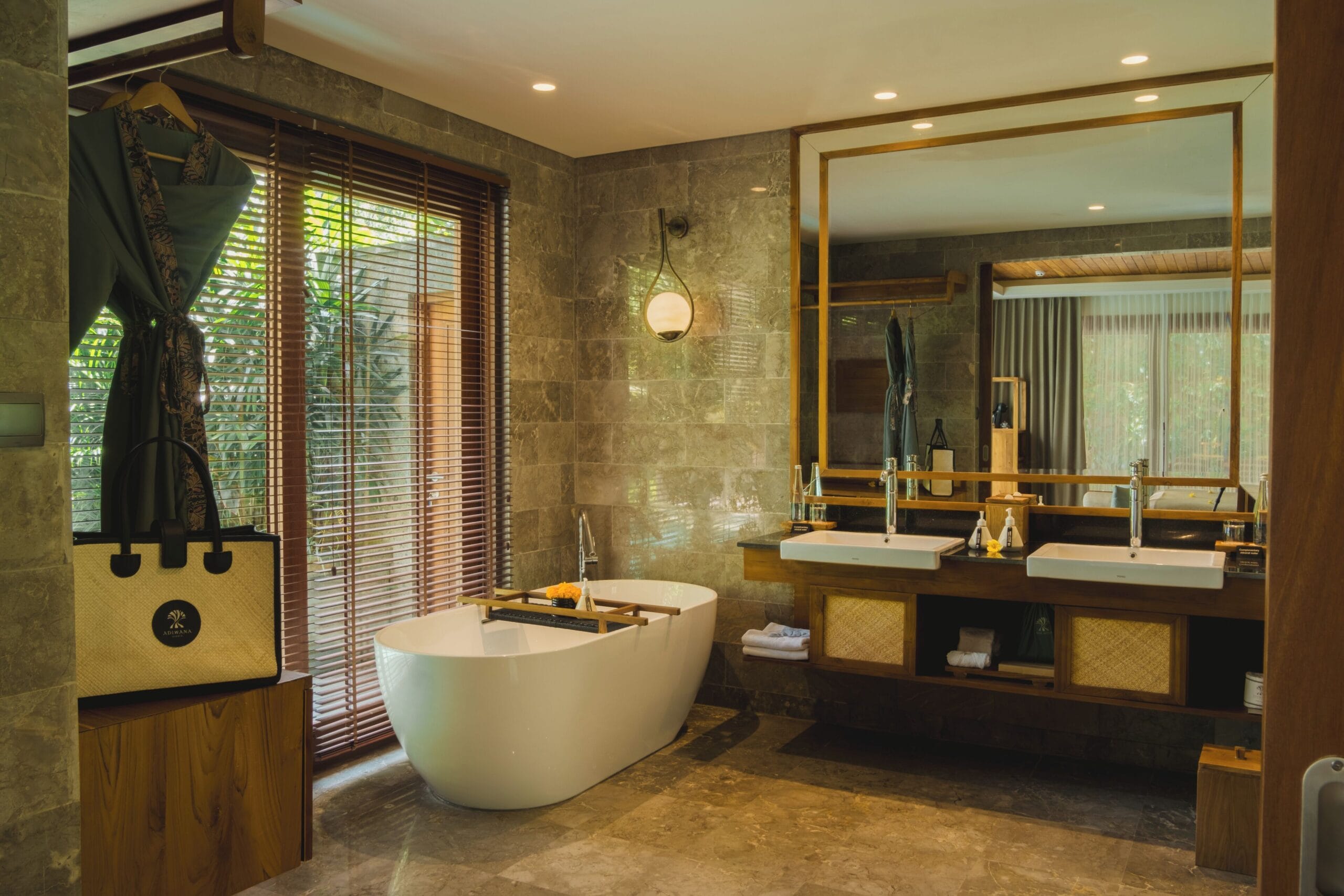 Villa bathroom with soaking tub at Adiwana Suweta, Ubud