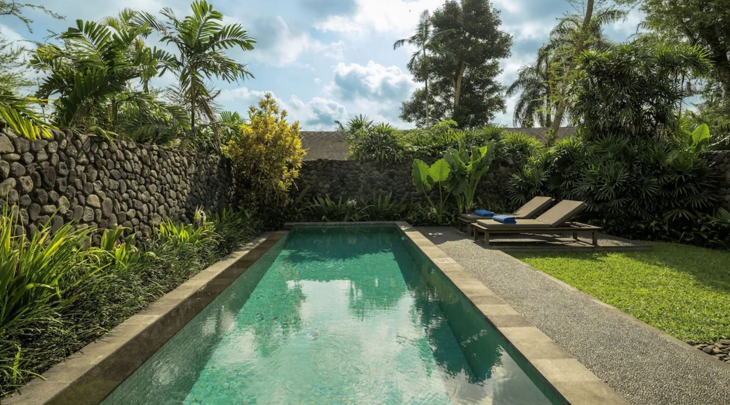 Private pool along the front of a walled Pool Villa at Alila Ubud, Bali