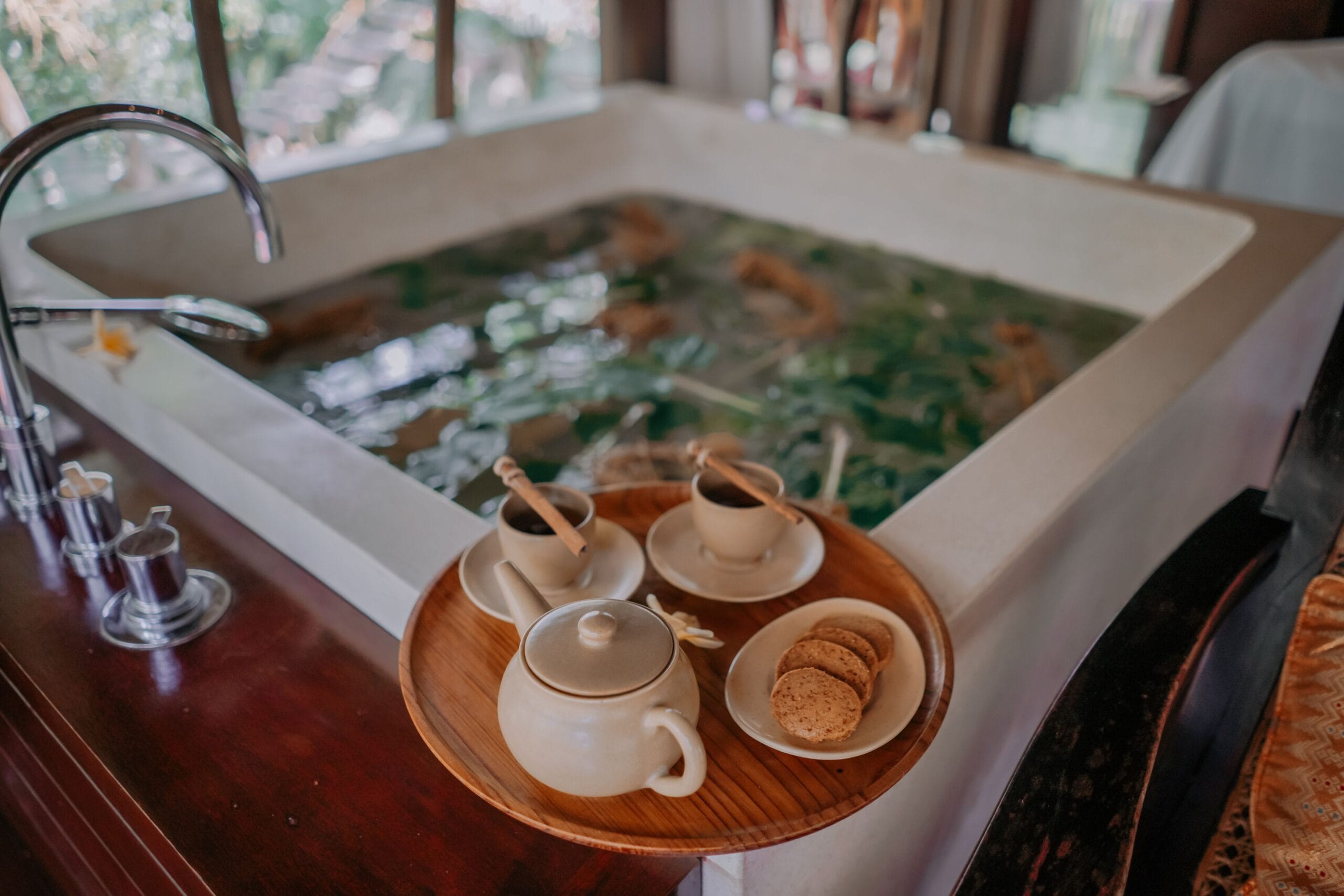 Open-air soaking bath in a villa bathroom at Kayumanis Ubud, Bali