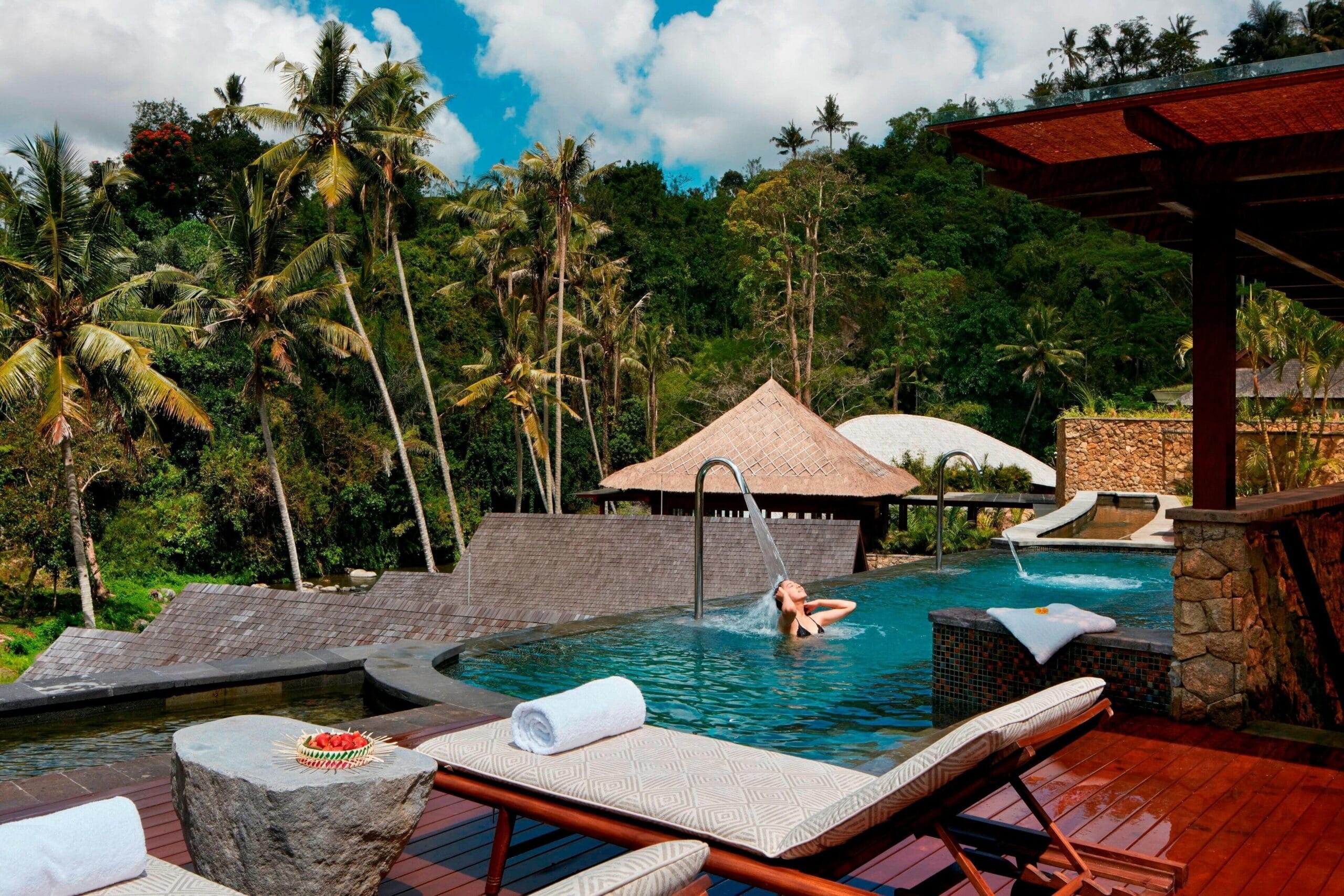 Large private pool outside a villa at Mandapa, a Ritz-Carlton Reserve in Ubud, Bali