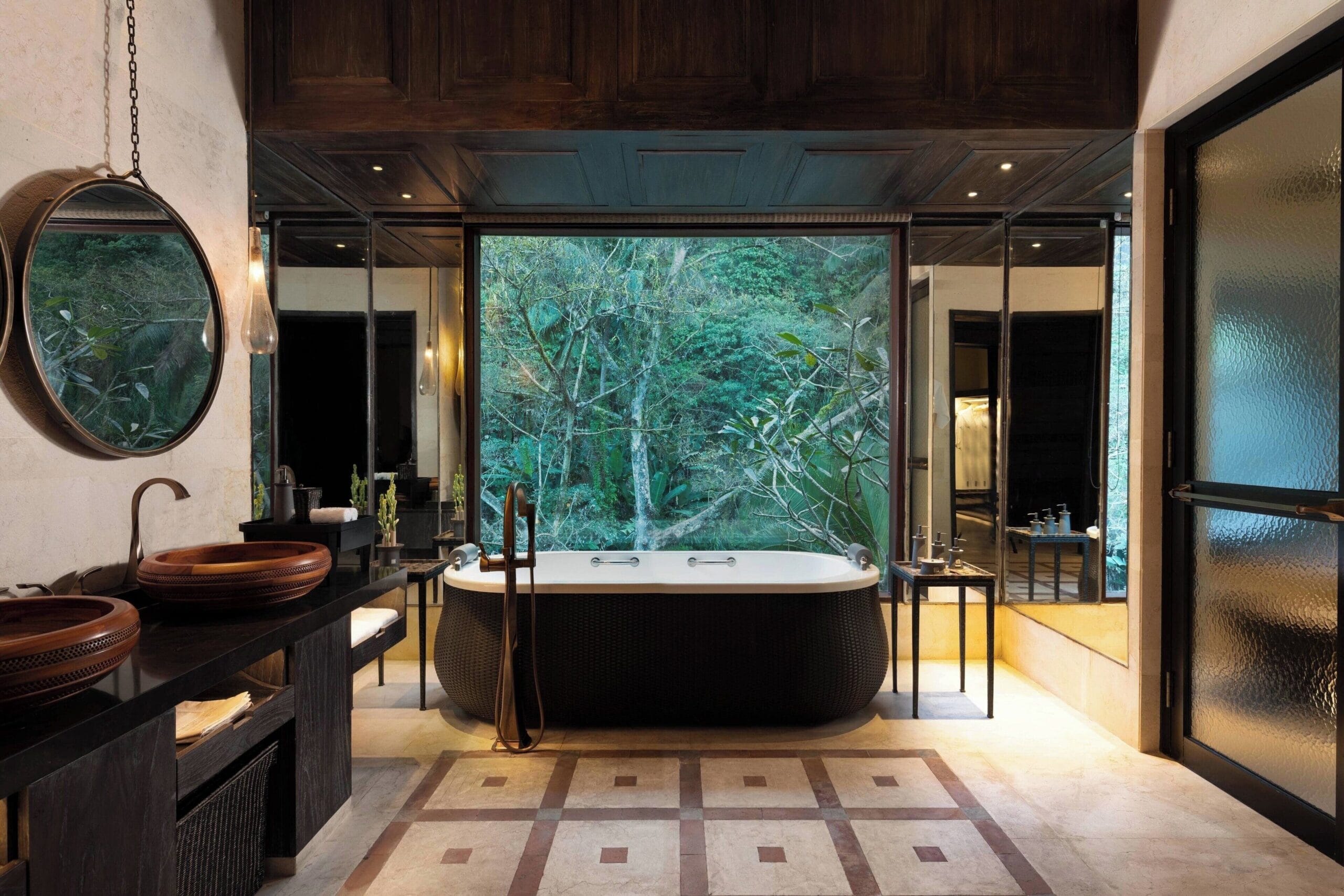 Villa bathroom with standalone soaking tub at Mandapa, a Ritz-Carlton Reserve, Ubud