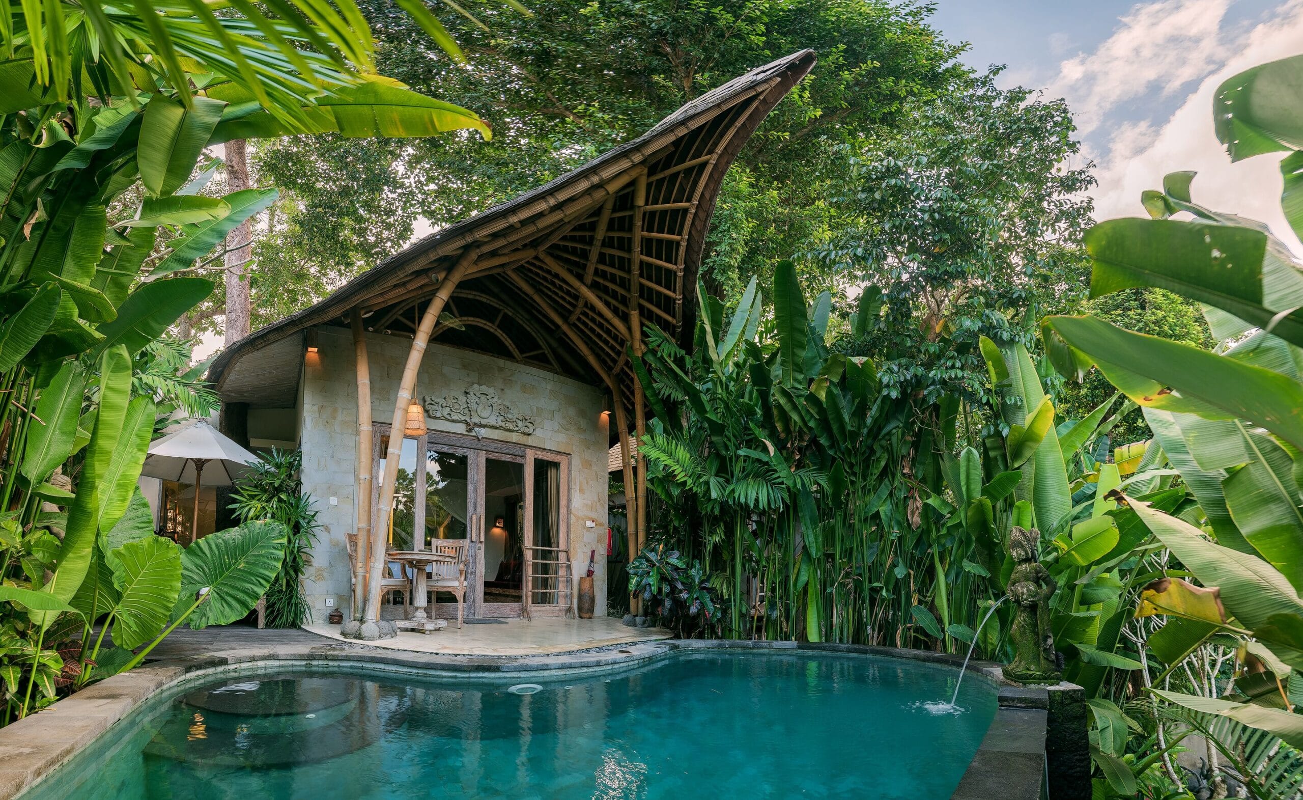 Private pool on a villa terrace surrounded by gardens at The Udaya Resorts and Spa, Ubud